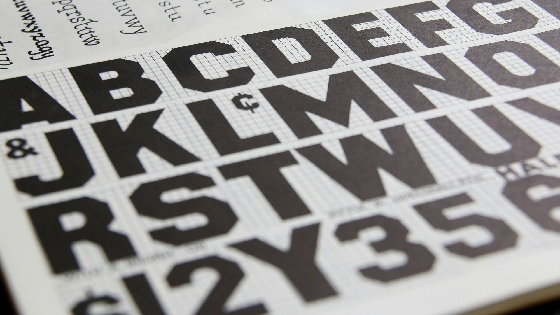 a close up of a book with letters and numbers