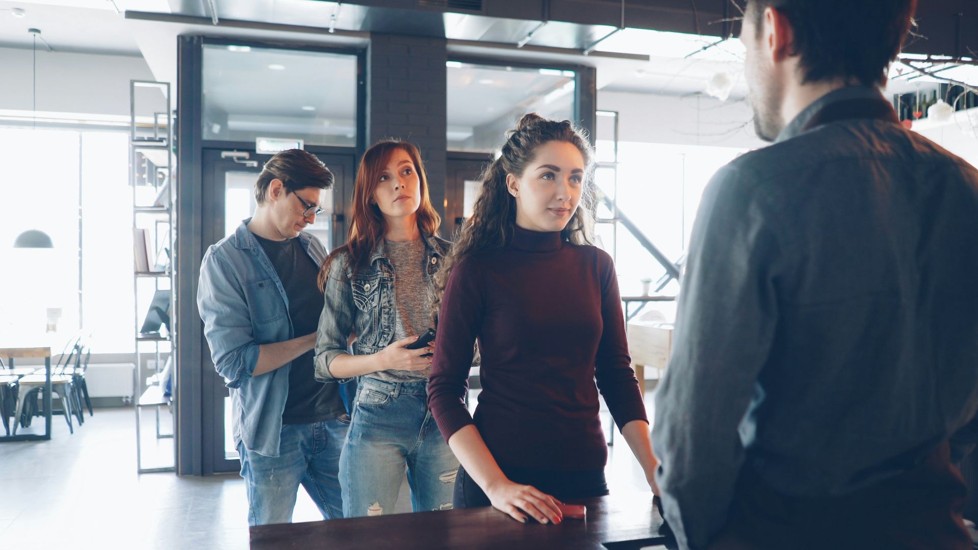 A group of people are in a business meeting.