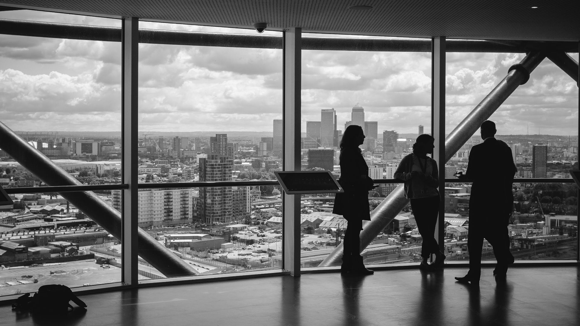 people standing inside city building