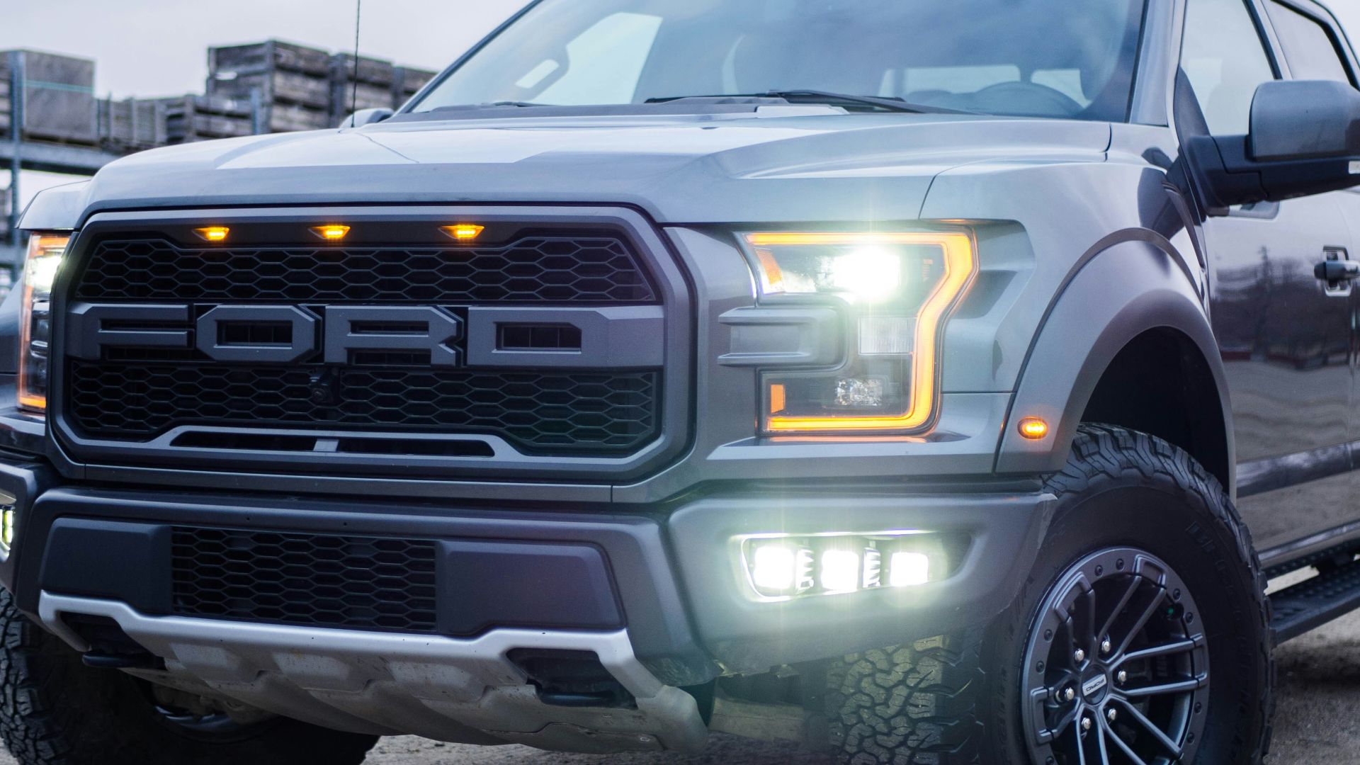 black chevrolet crew cab pickup truck on road during daytime
