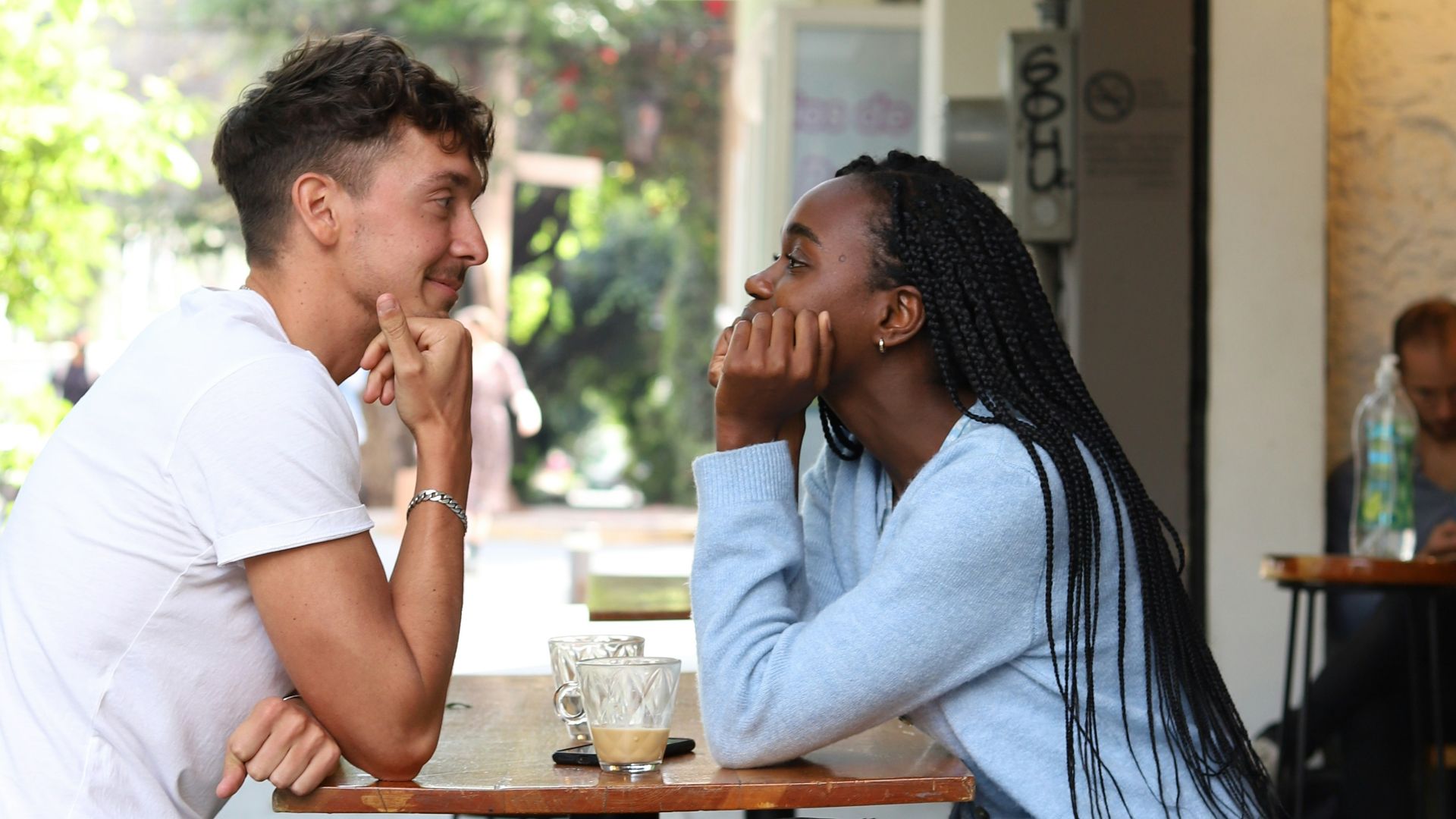a man and a woman sitting at a table