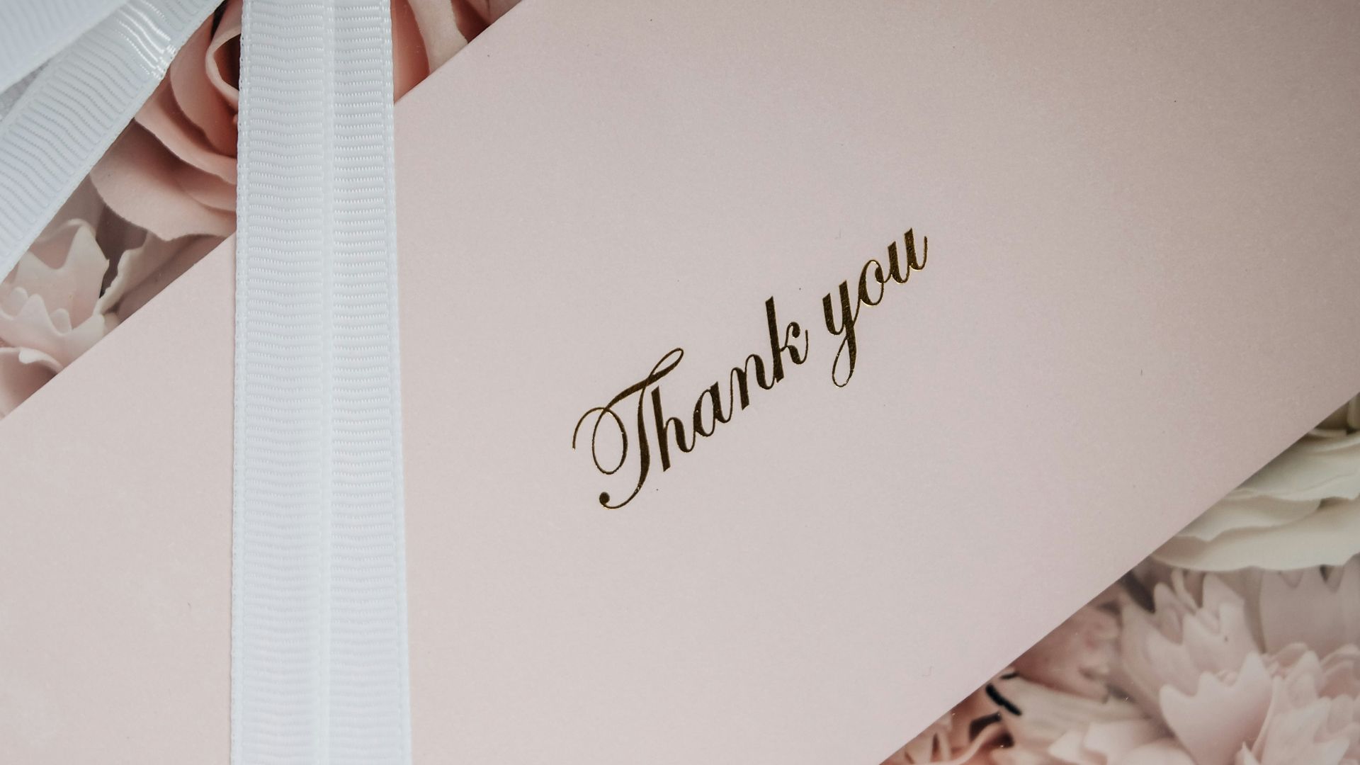 white box with white ribbon