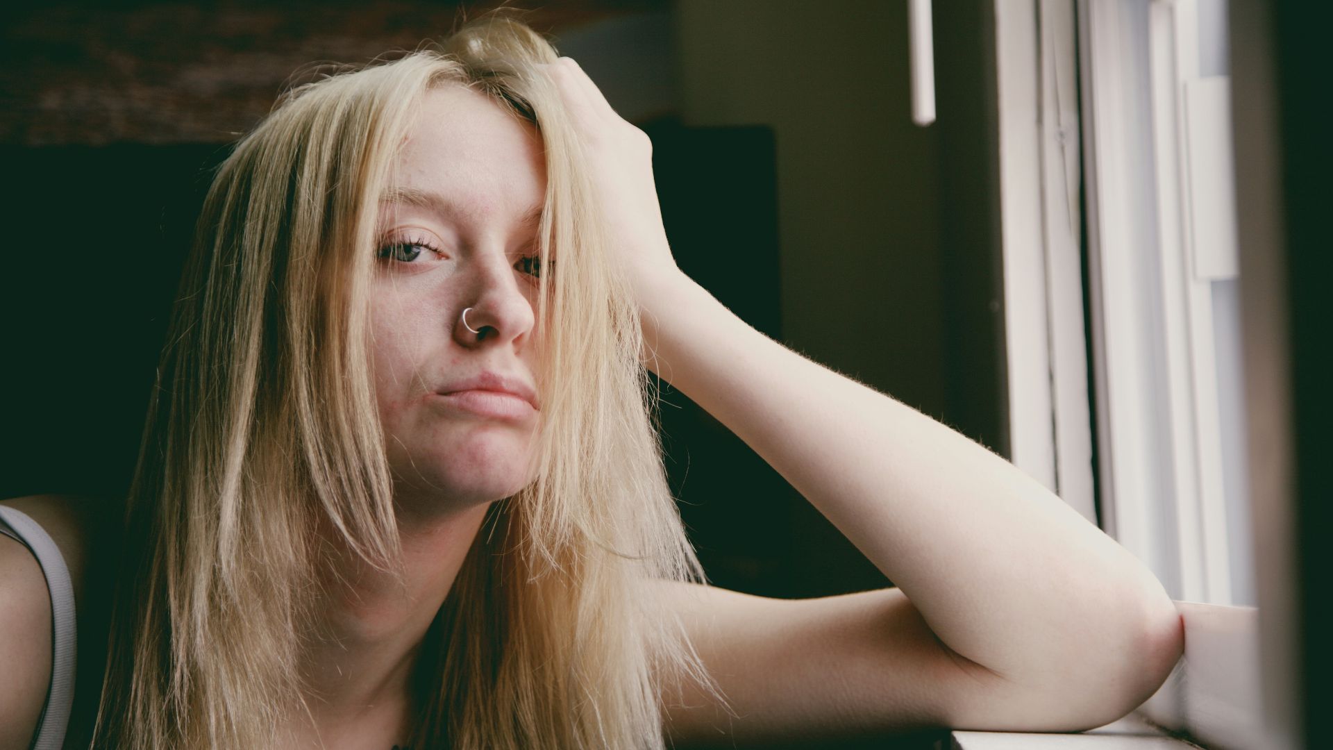 woman in black tank top