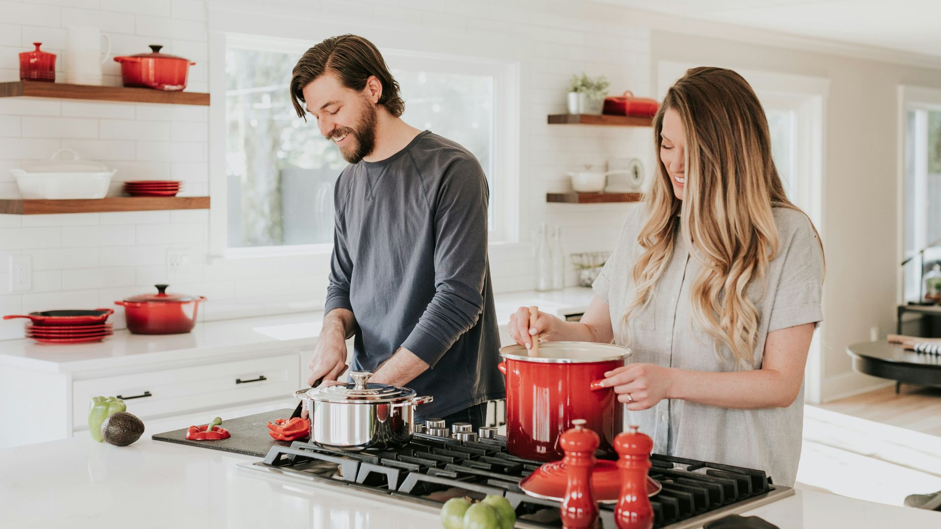 man and woman on kitchen