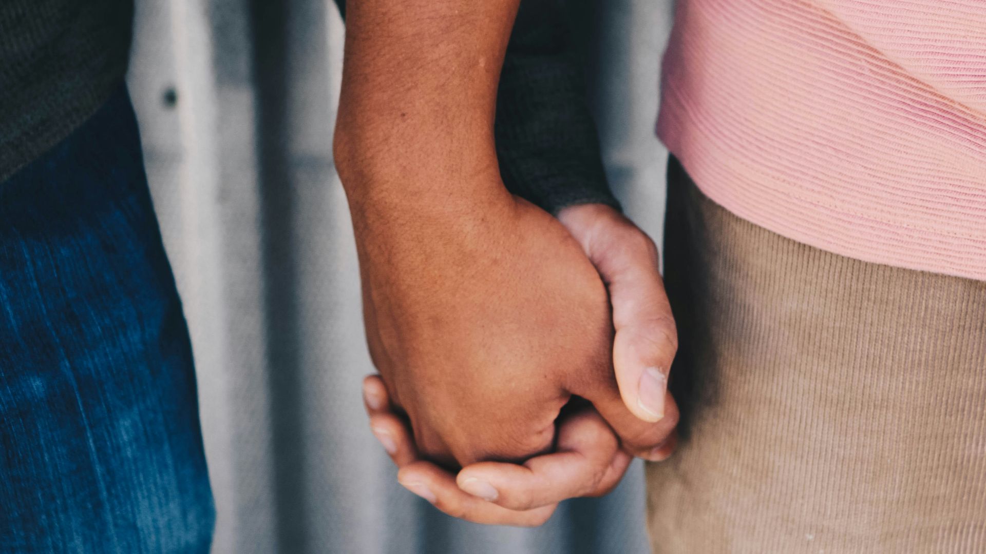 focus photo of couple's hands