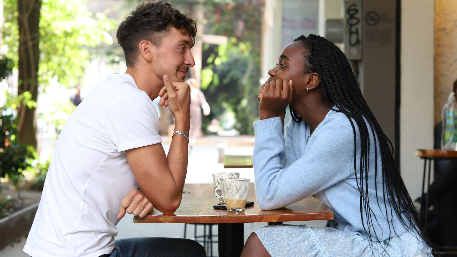 a man and a woman sitting at a table