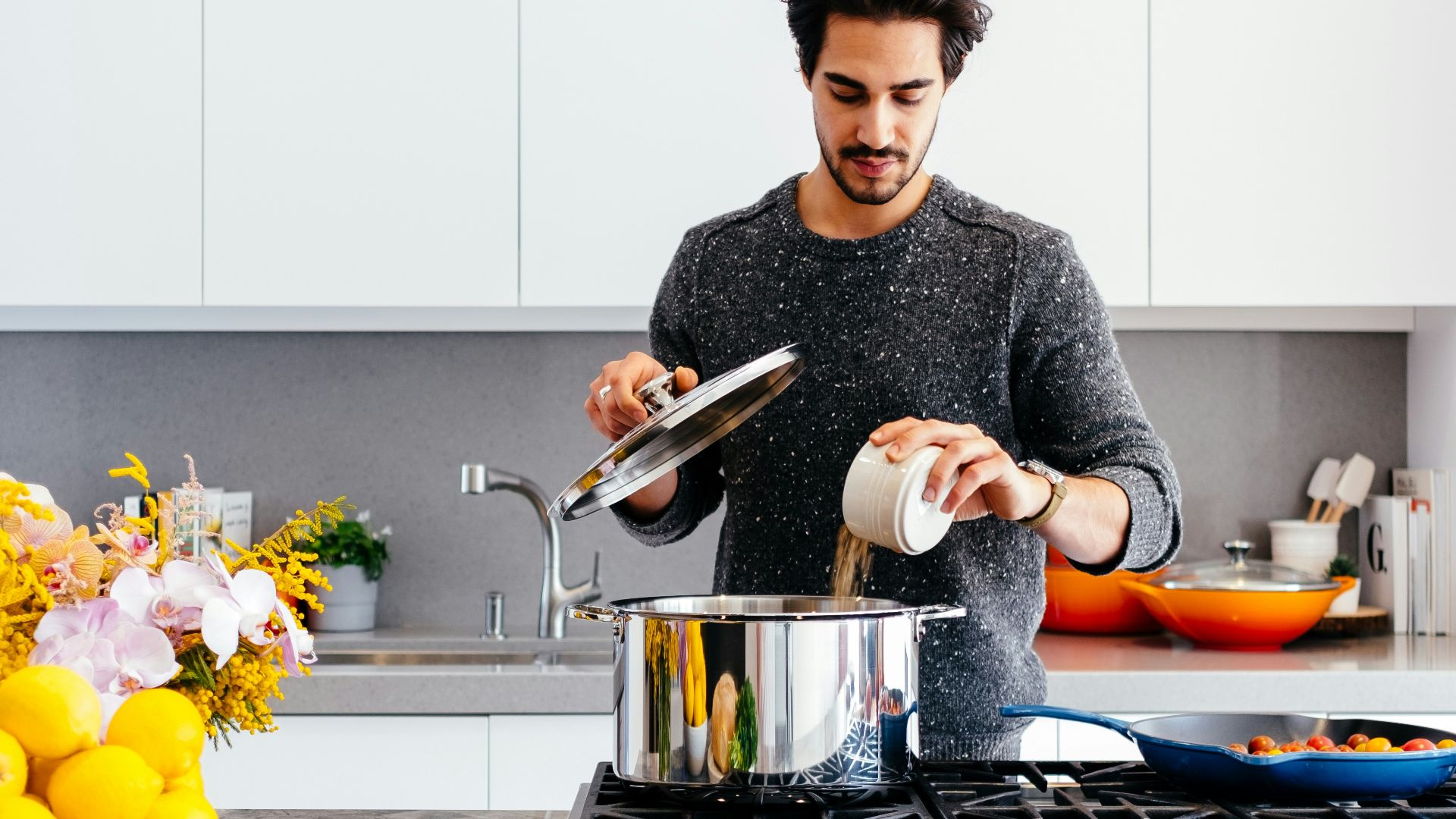 man standing inside kitchen room