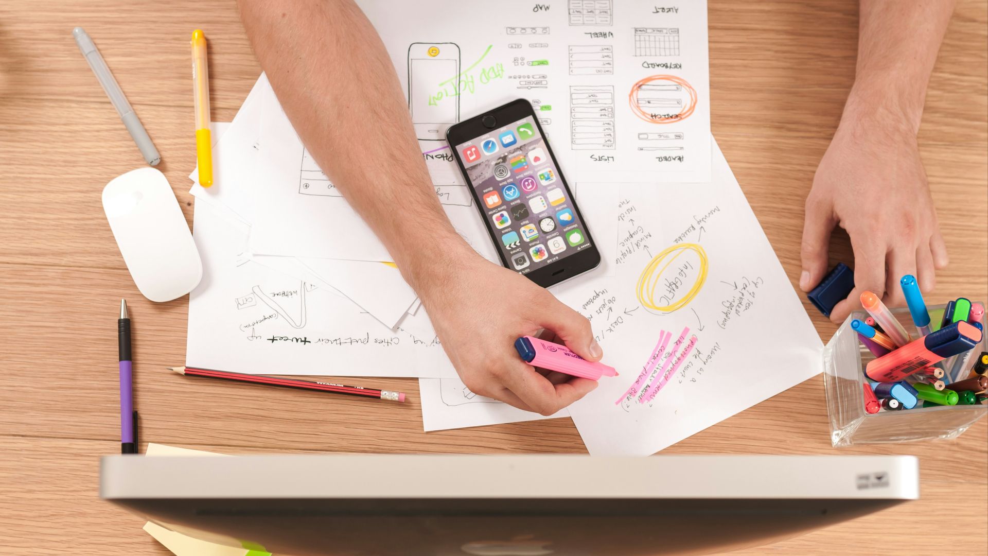 person writing on white paper