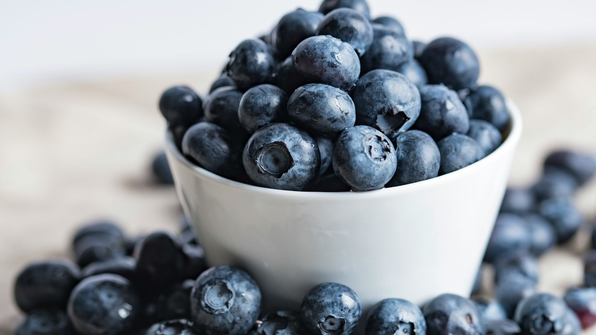 blueberries on white ceramic container