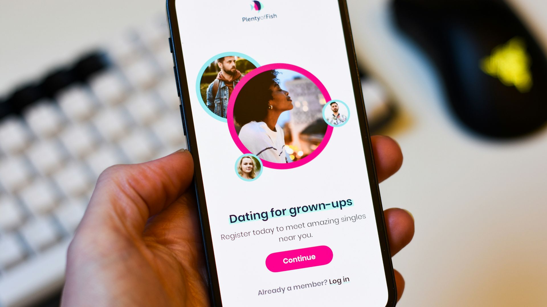 a person holding a cell phone in their hand