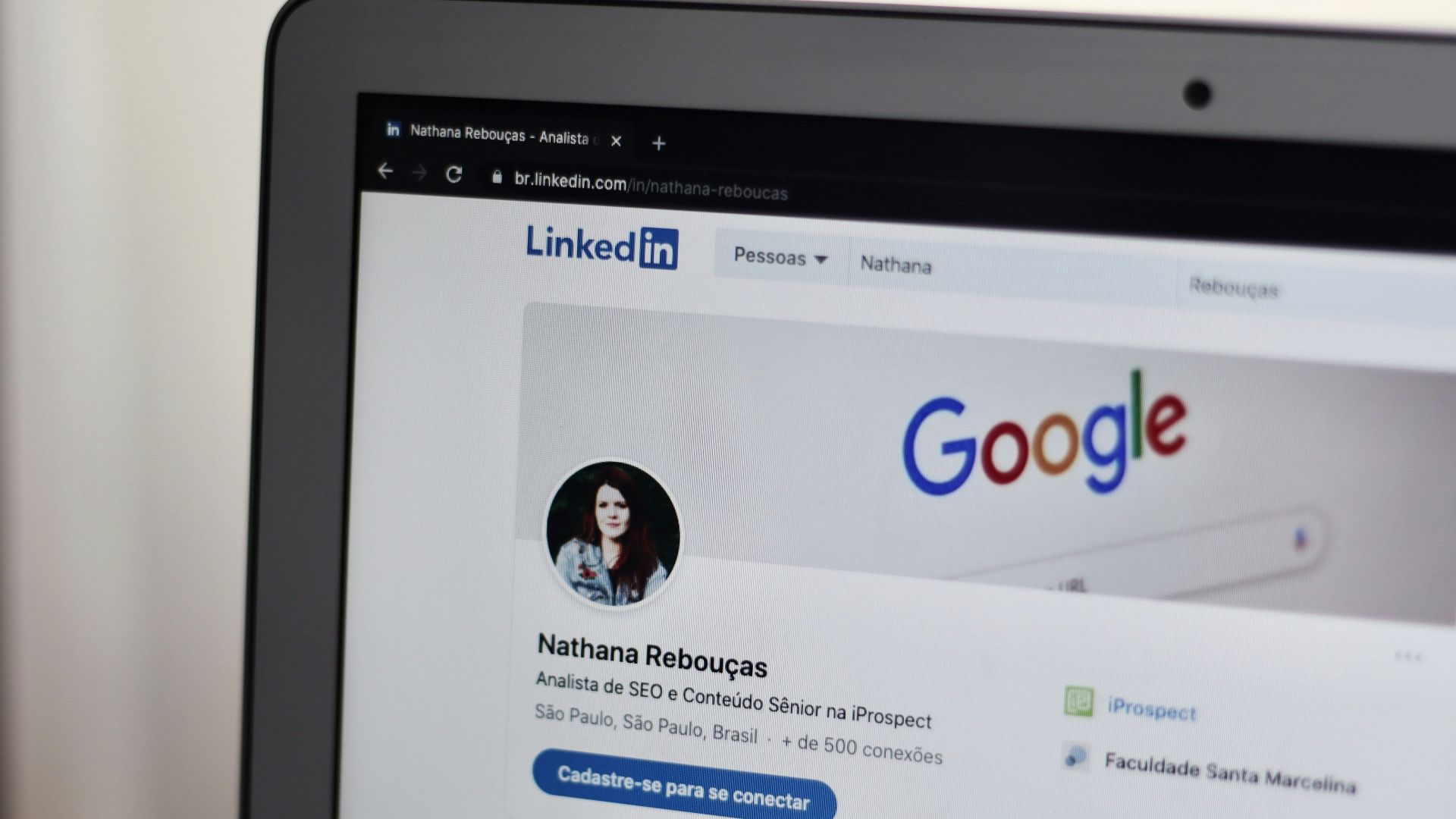 black tablet computer turned on displaying facebook