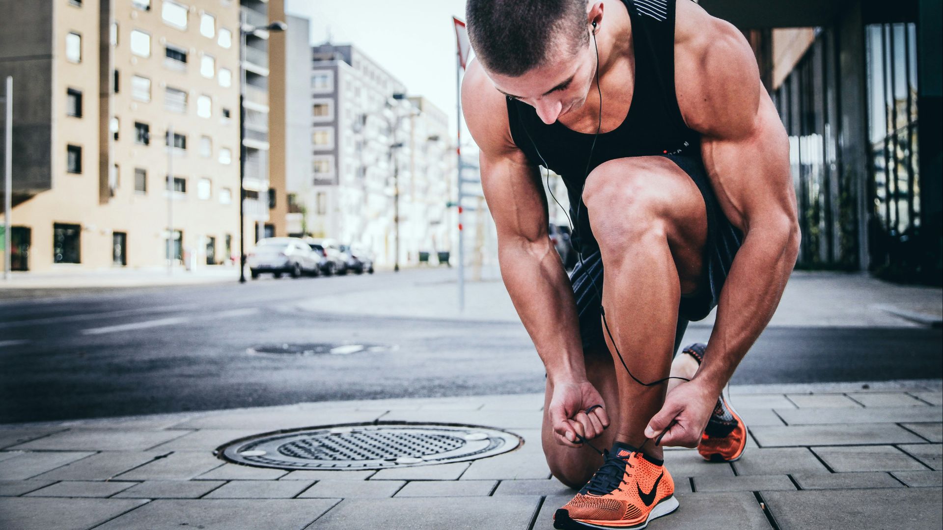 man tying his shoes
