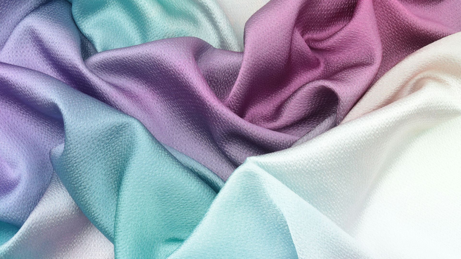 blue textile on white textile