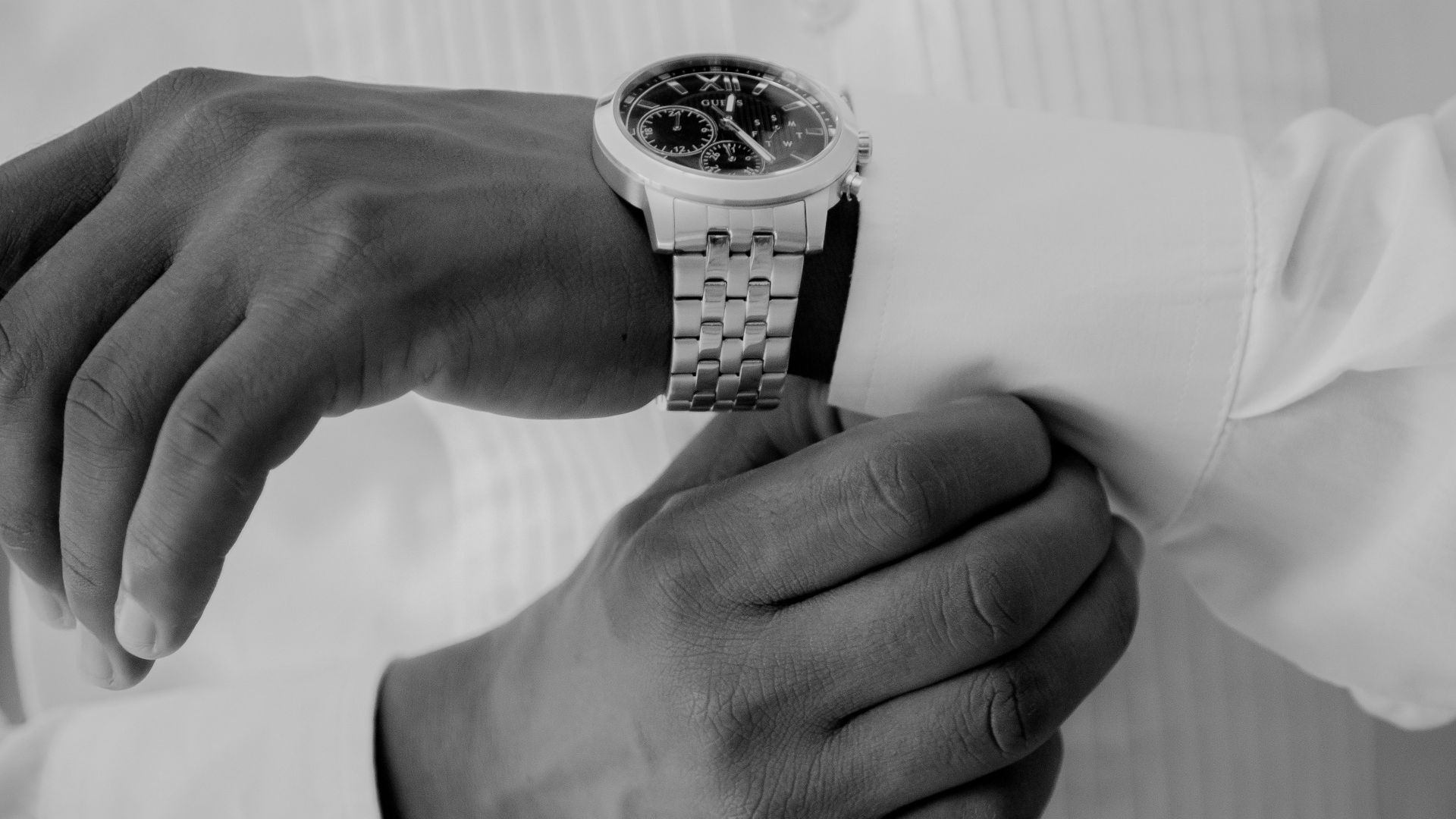 a close up of a person wearing a watch
