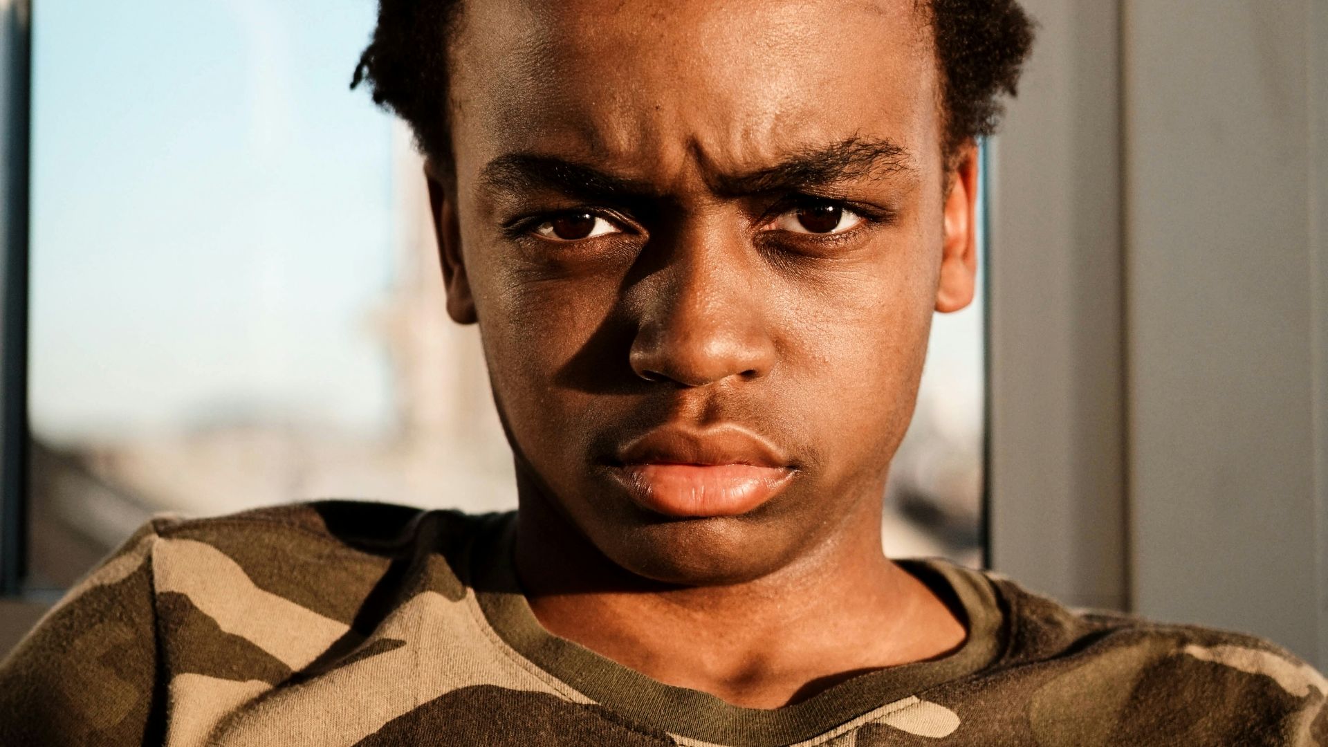 man wearing Nike camouflage t-shirt