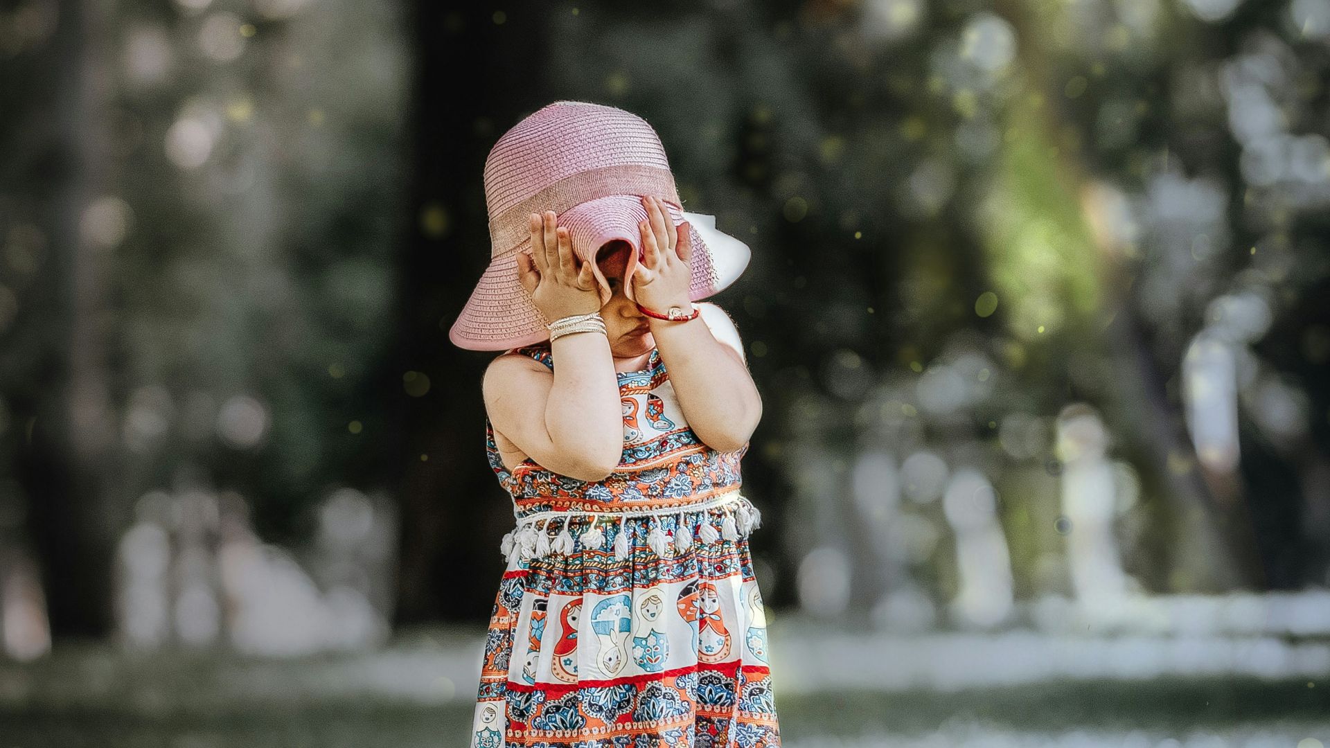 girl covering own face