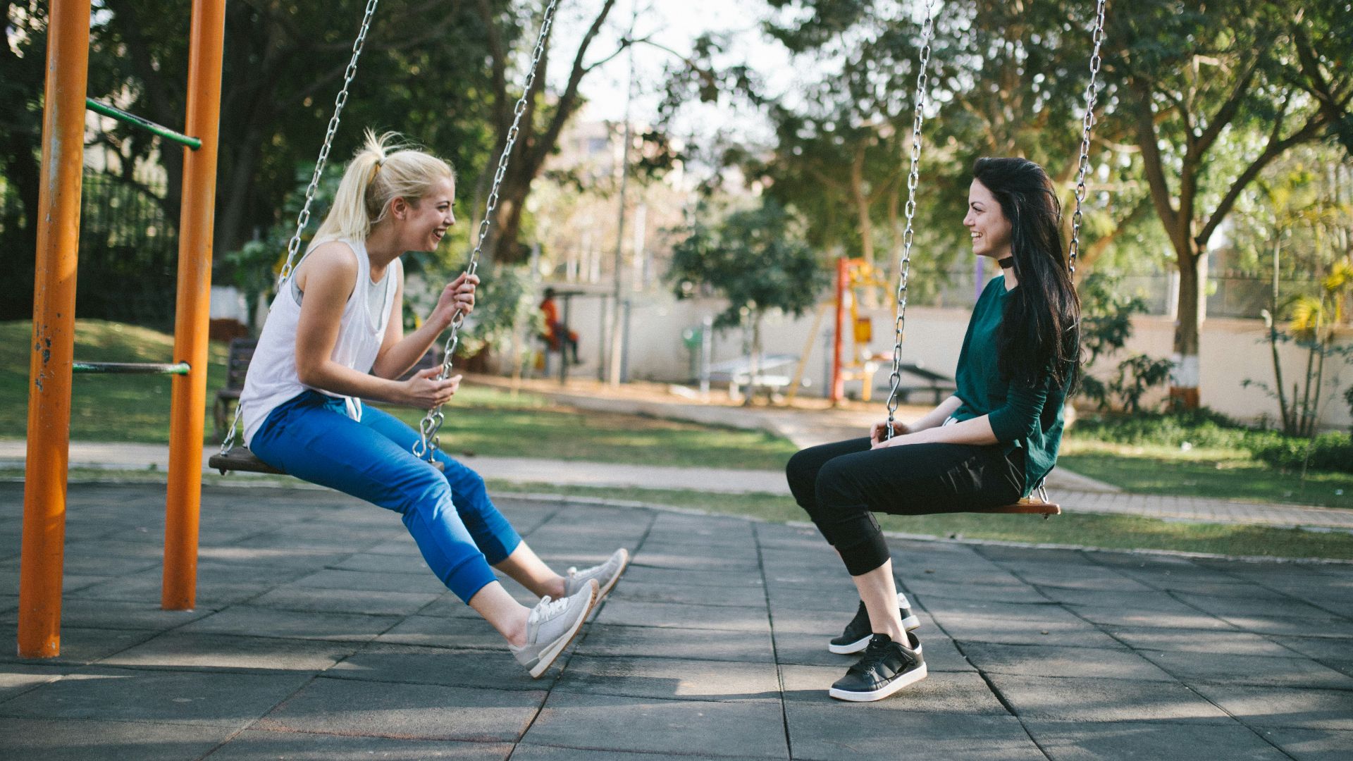 woman sitting on swing