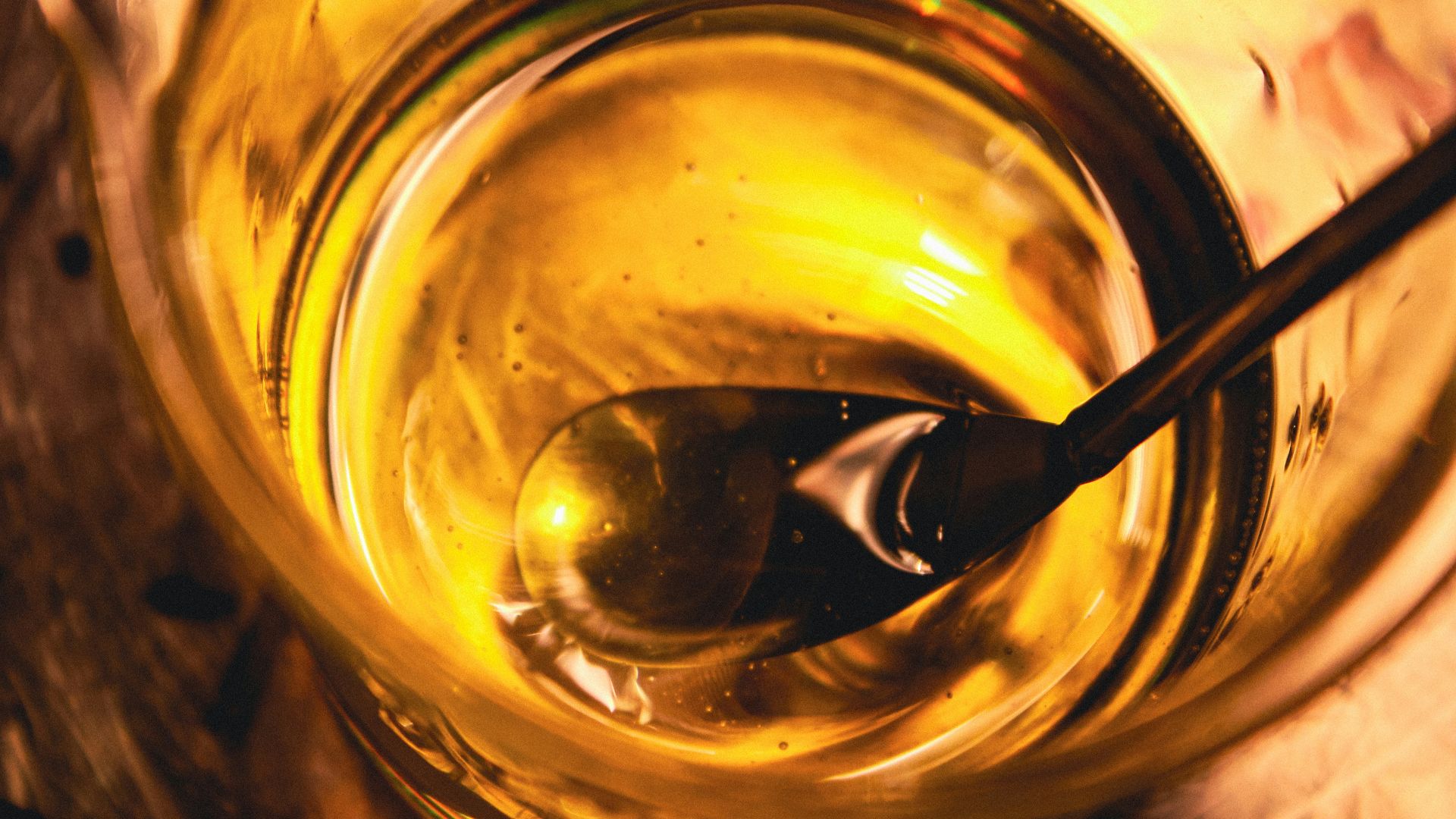 a spoon in a bowl of soup