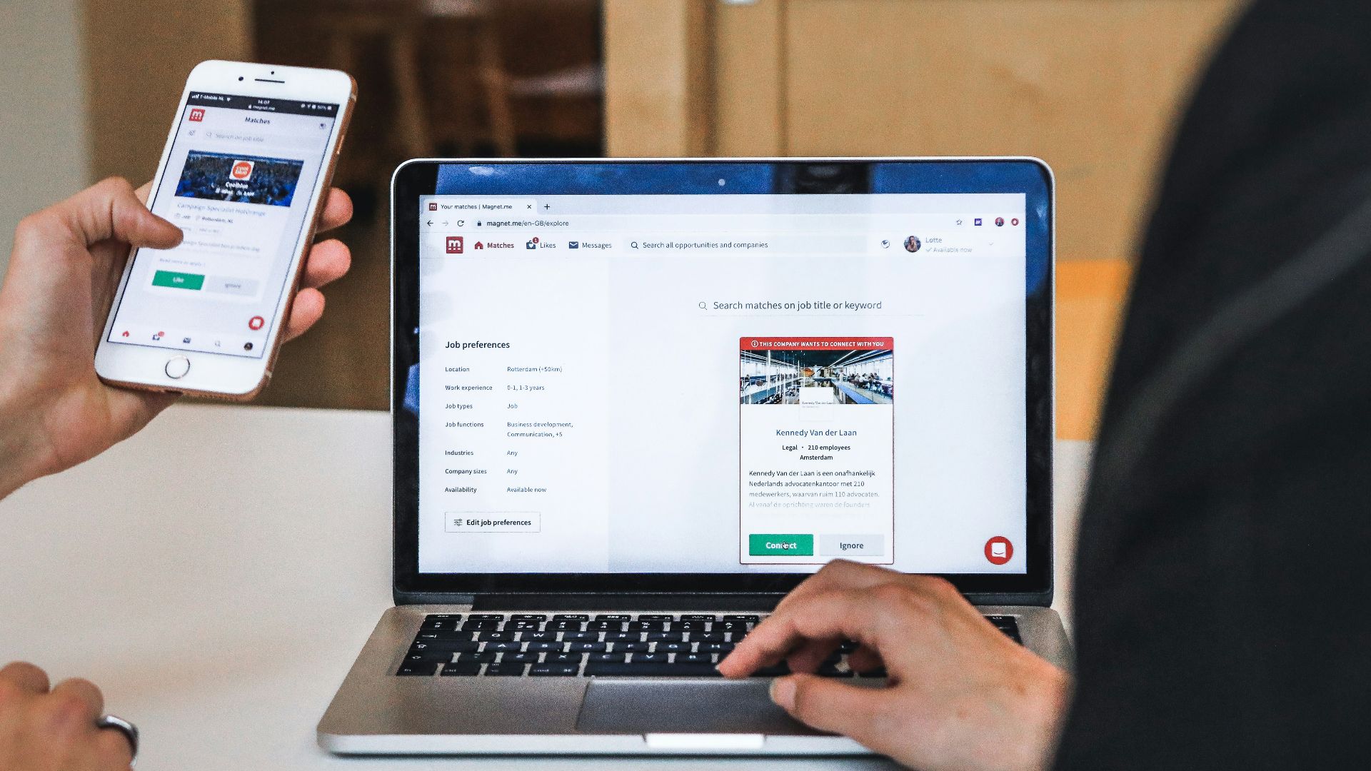 person holding silver iphone 6