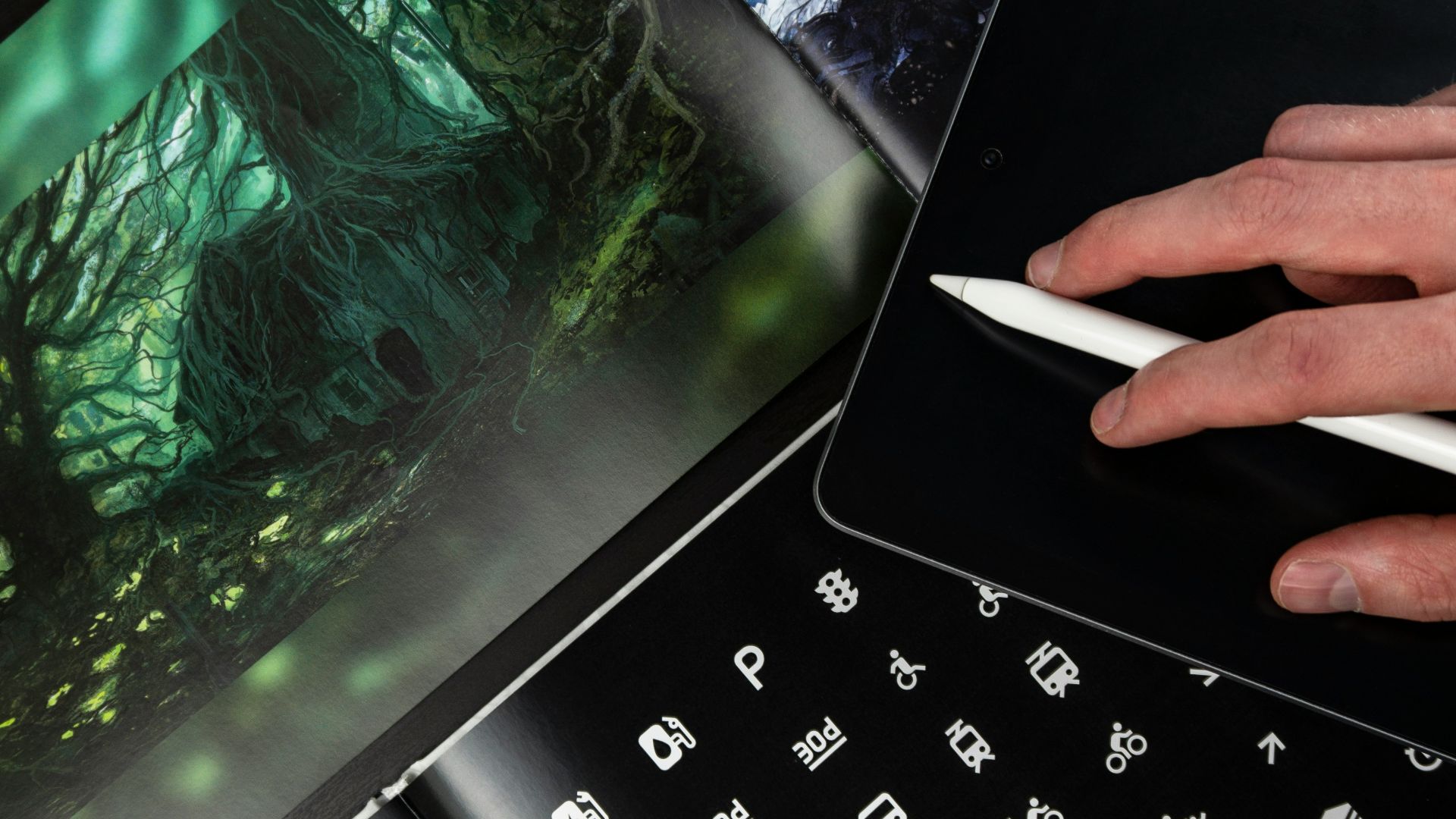 two open book with iPad and drawing pen