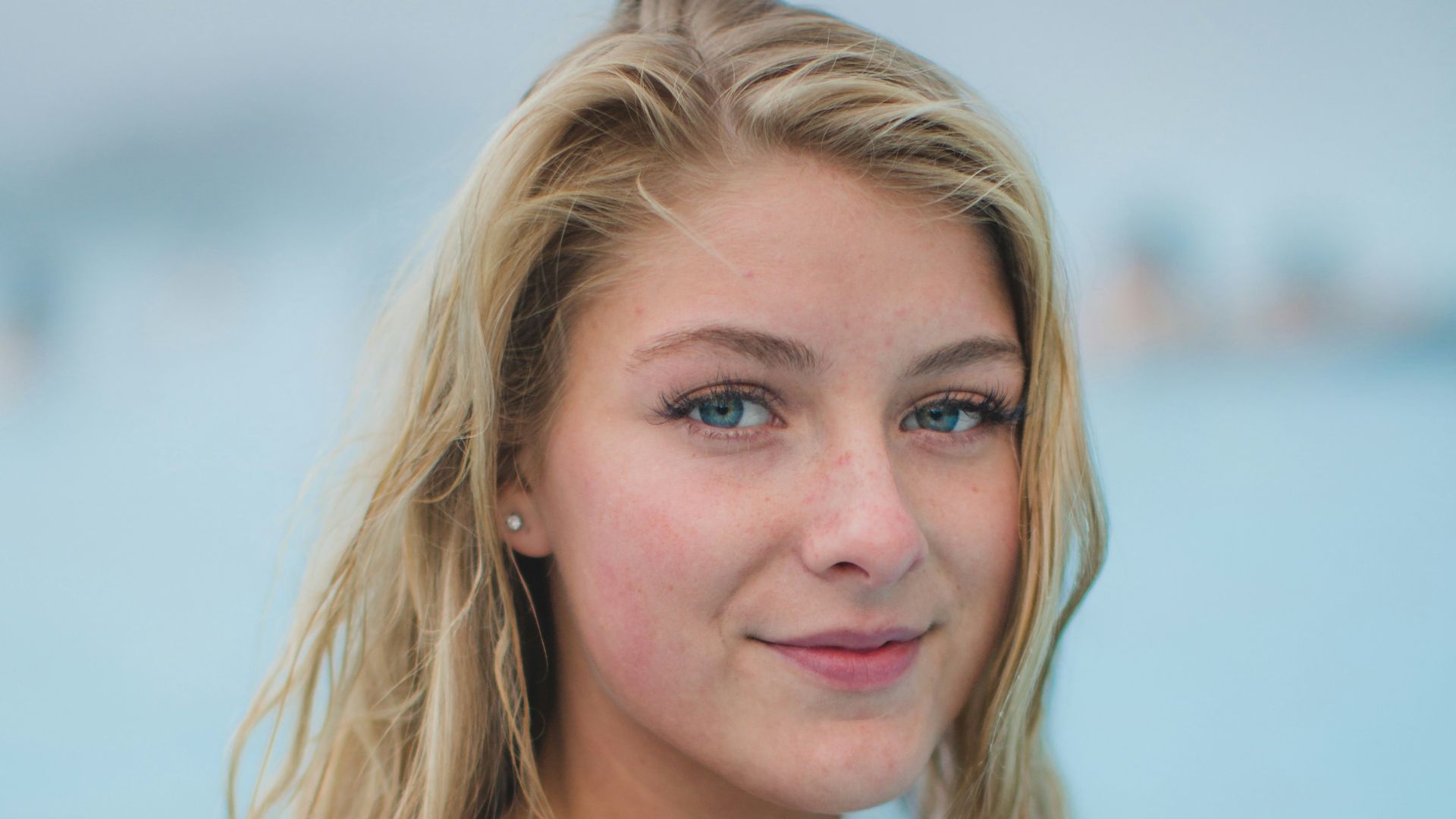 woman in blue tank top in water