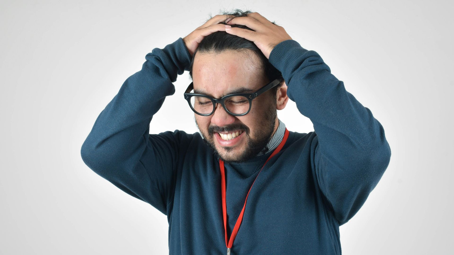 man in bluee ssweater