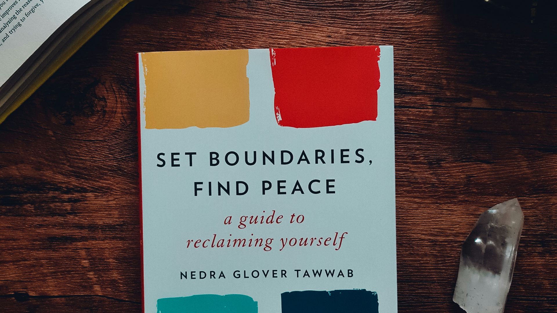 a book sitting on top of a wooden table