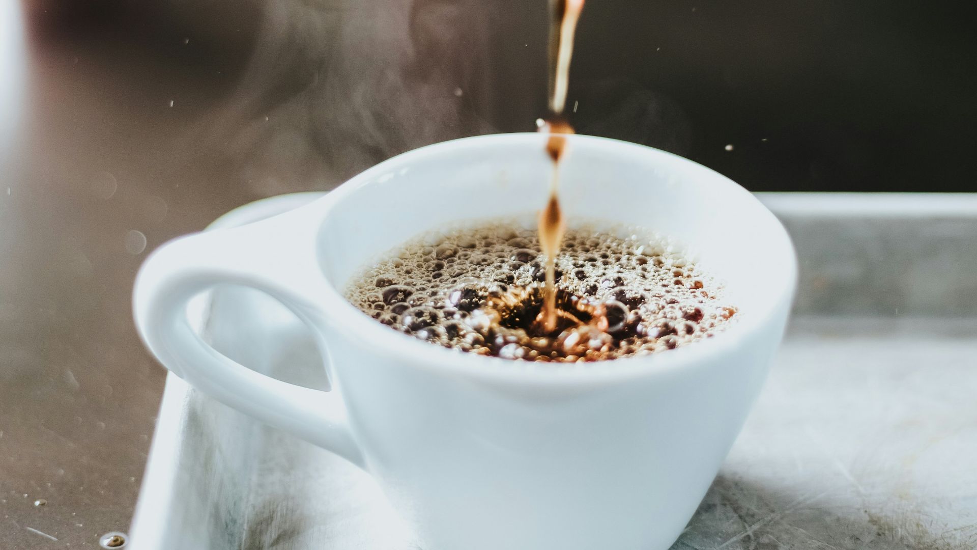 time lapse photography of coffee on cup