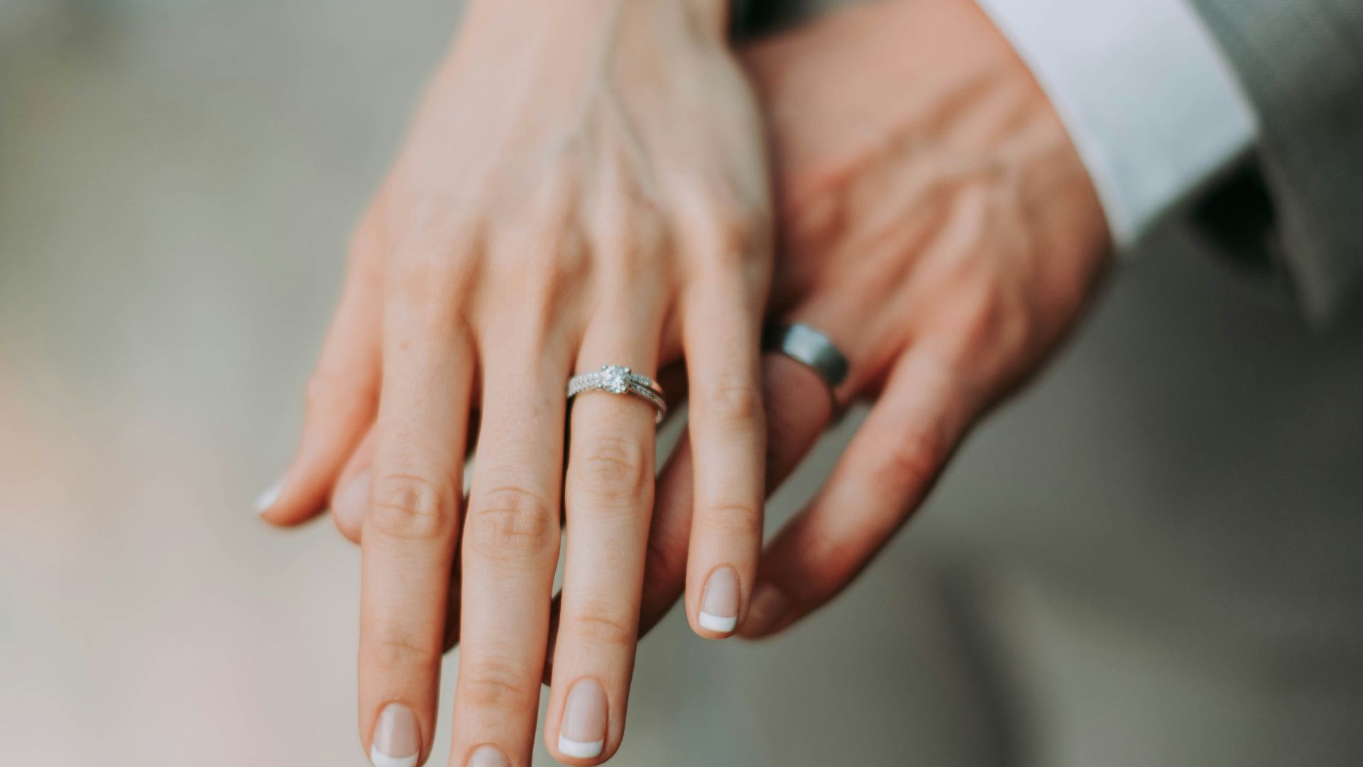 woman touch man's hand