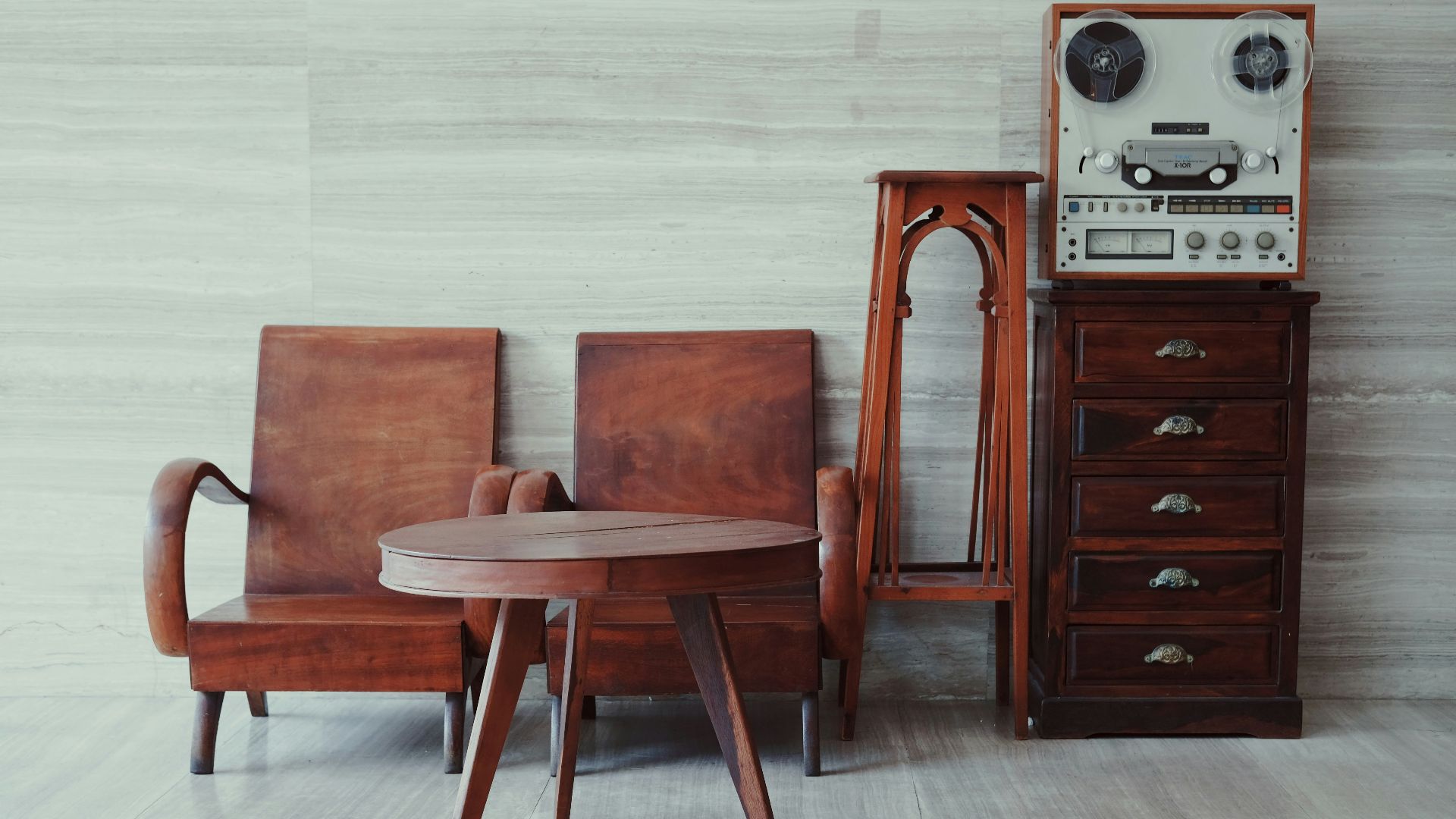 brown wooden chairs, table, and cabinet