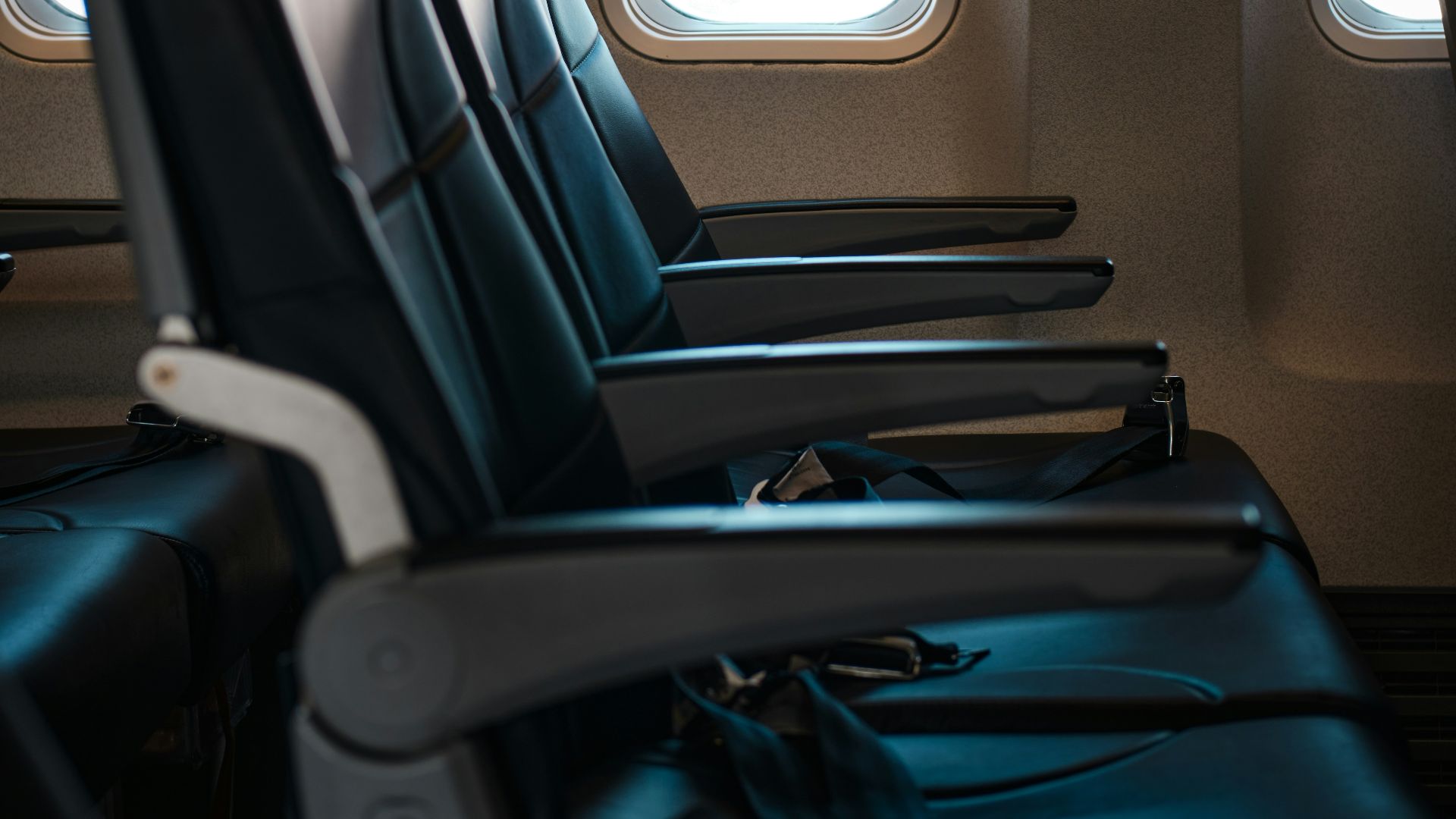 a row of empty seats in an airplane