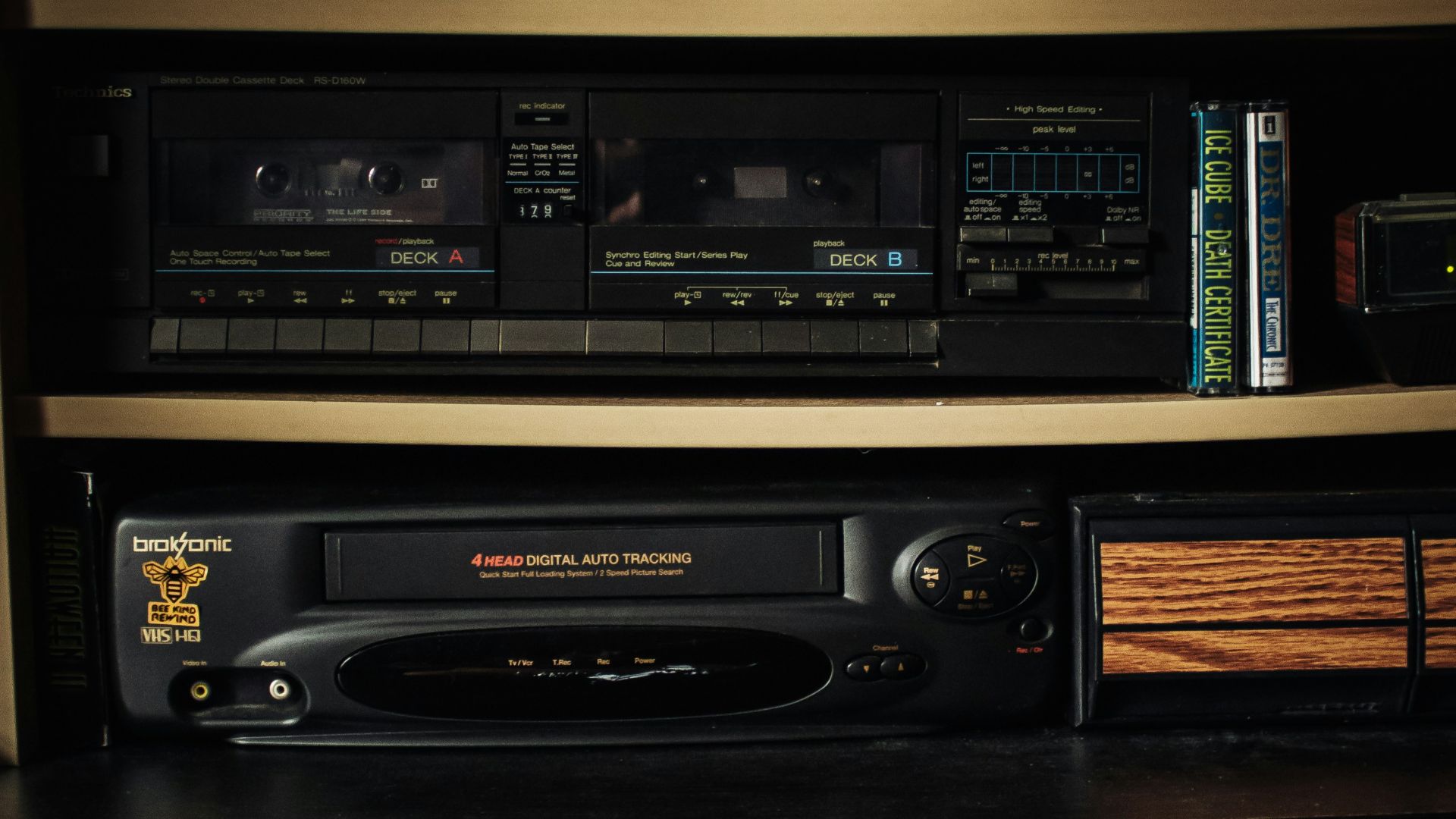 a shelf with a bunch of movies on it