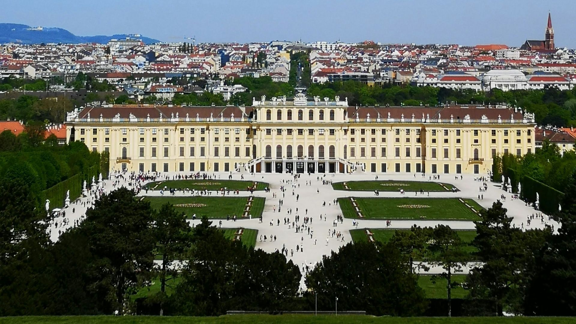 white concrete building under blue sky during daytime