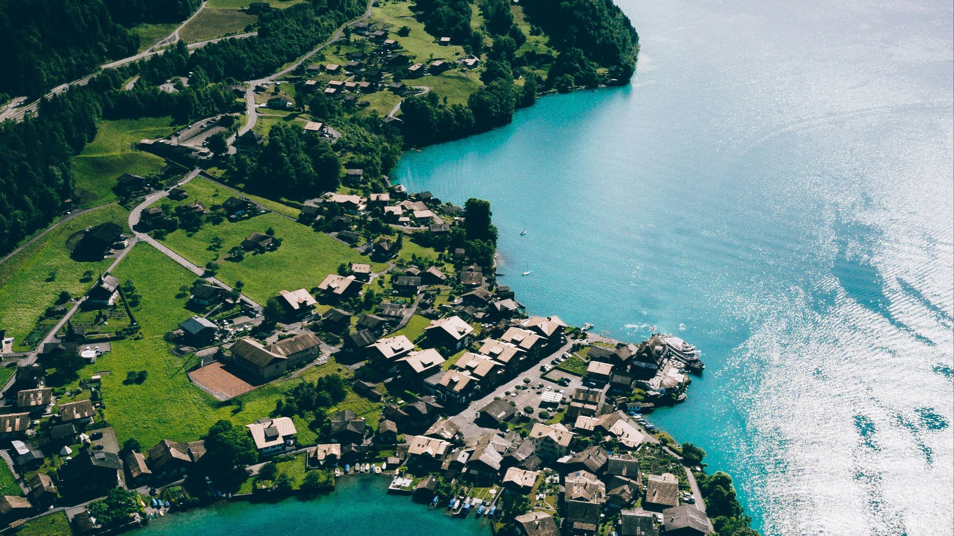 bird's eye view photography of boat on body of water