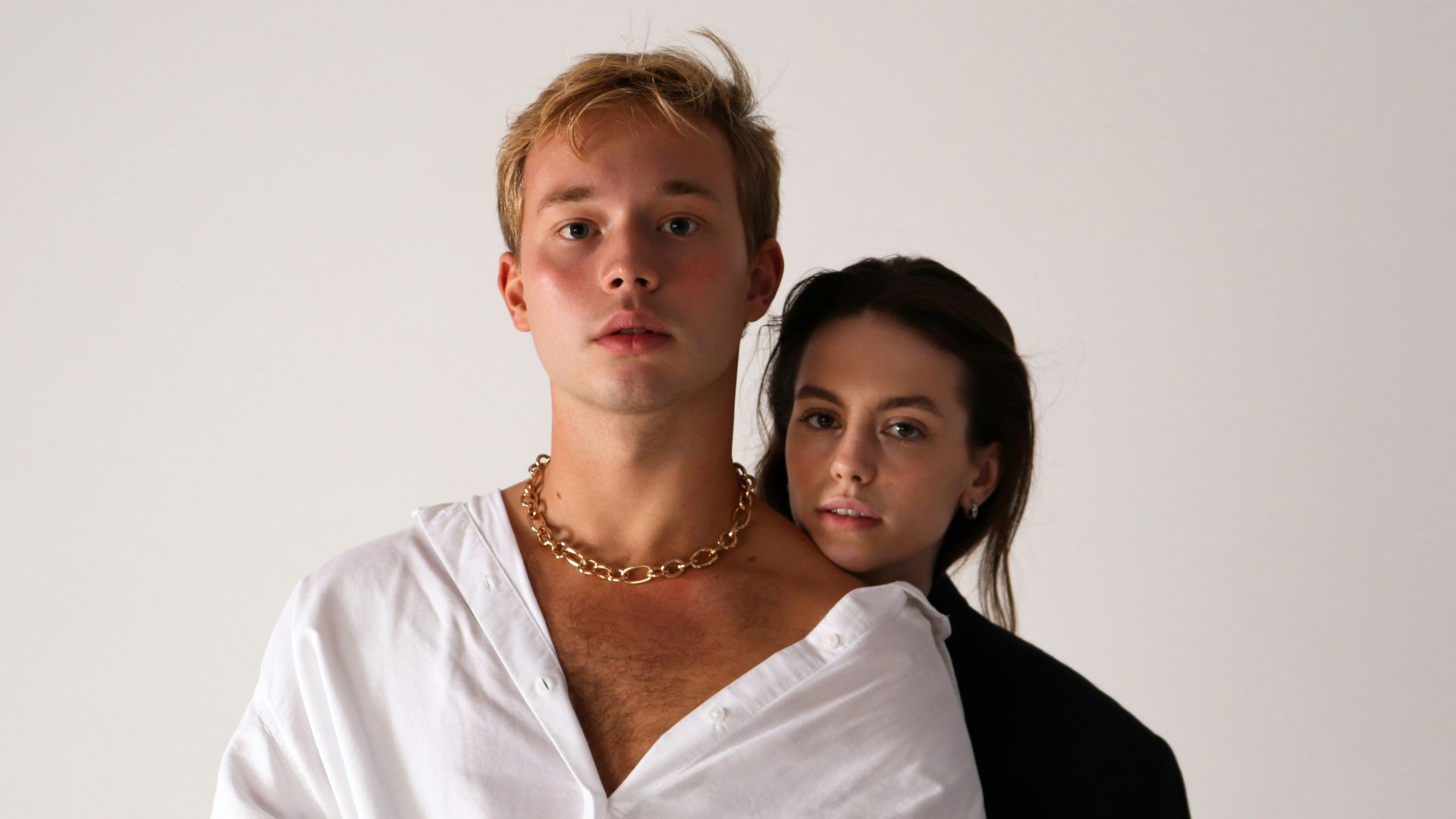 a man and a woman posing for a picture