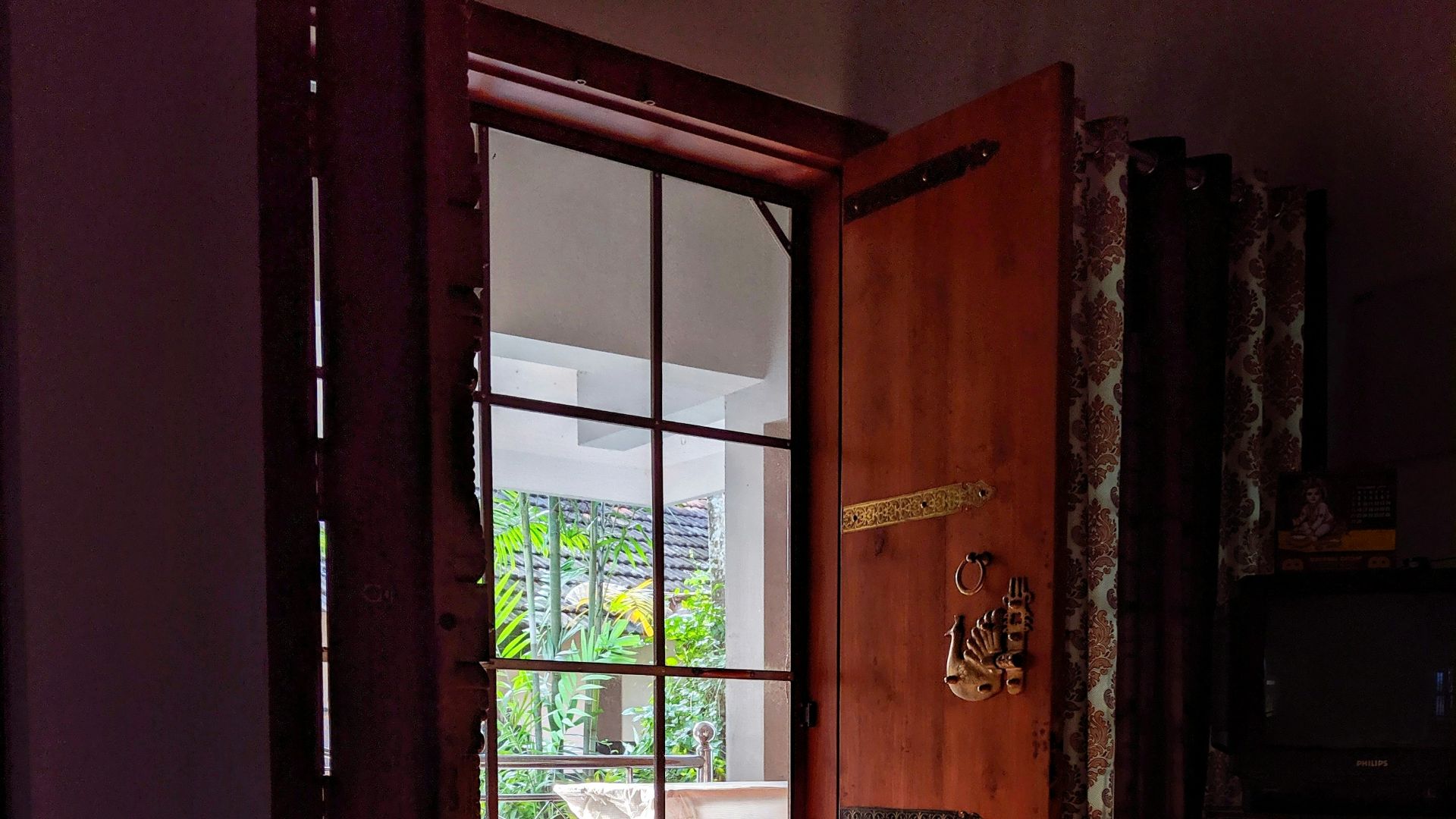 opened brown wooden door