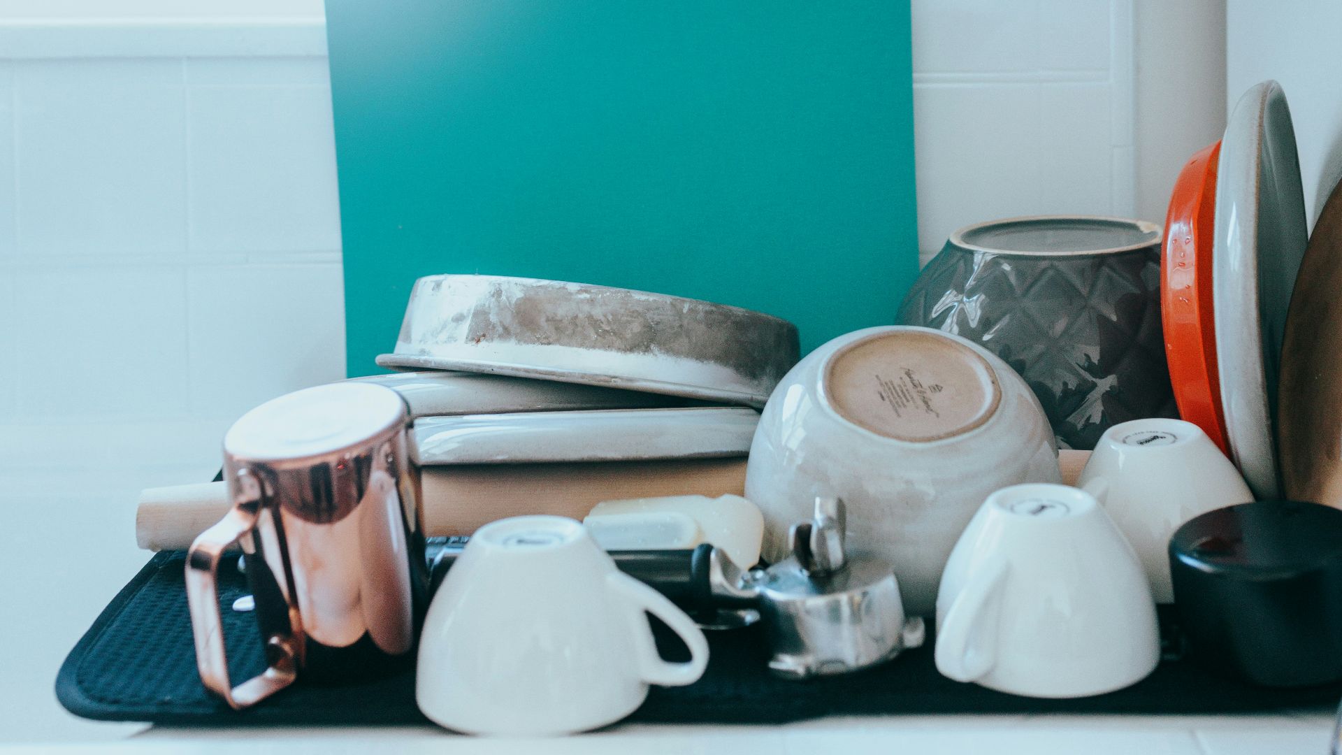 white wooden kitchen cabinet over white ceramic plate