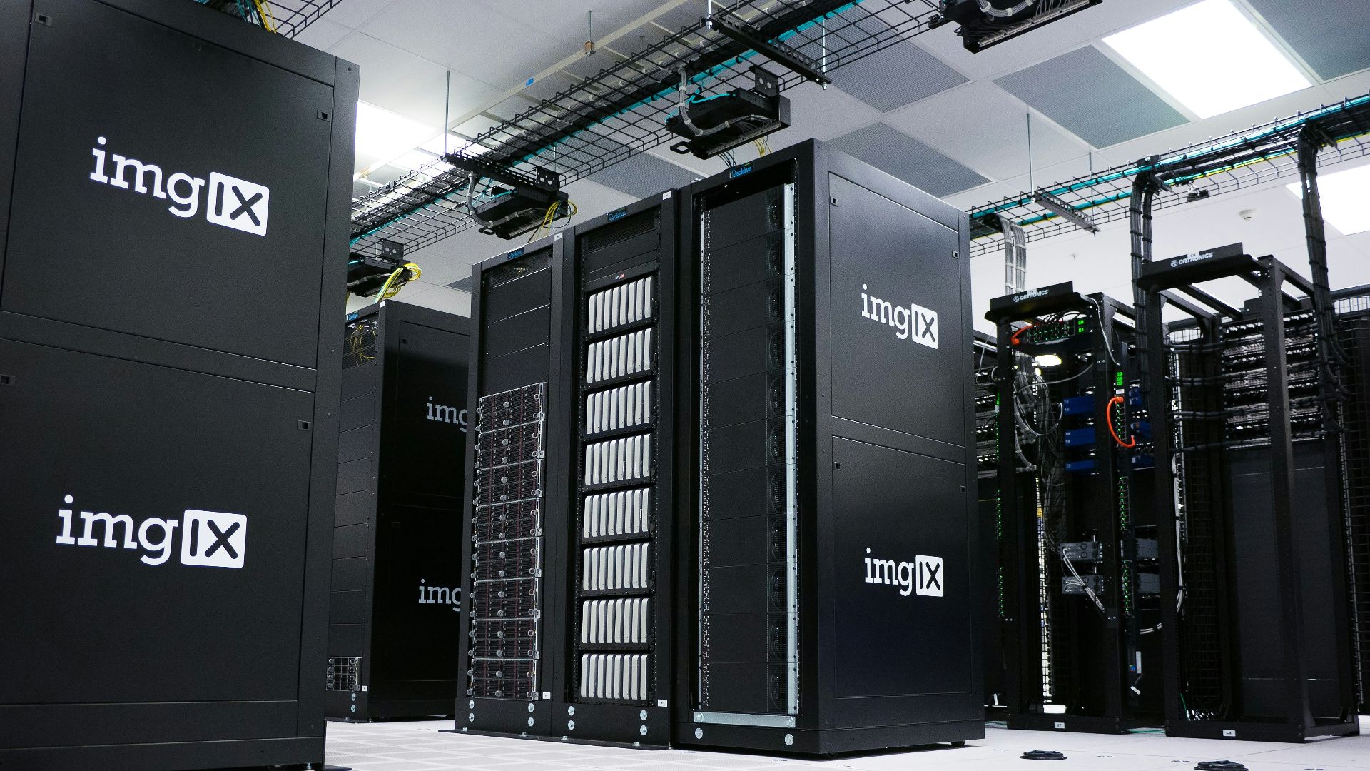 img IX mining rig inside white and gray room