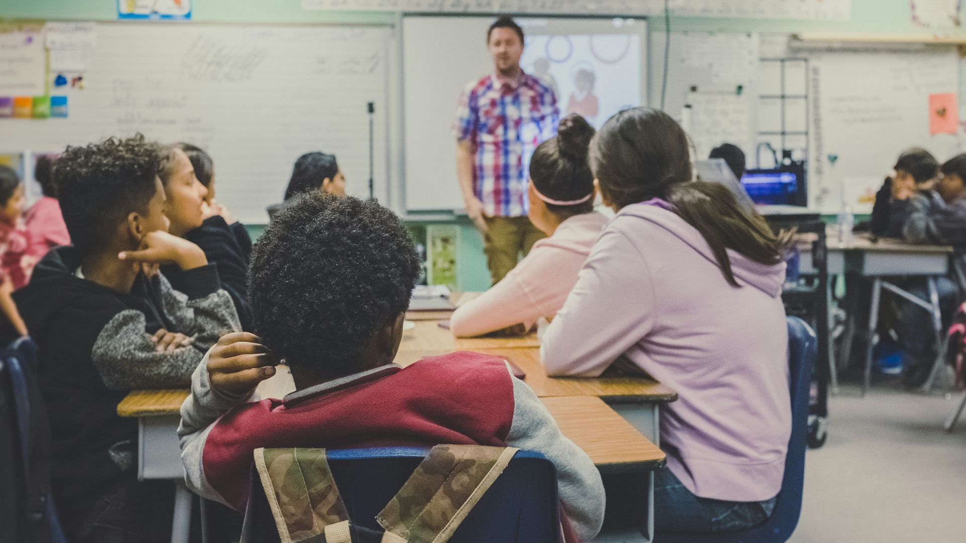 man and woman sitting on chairs
