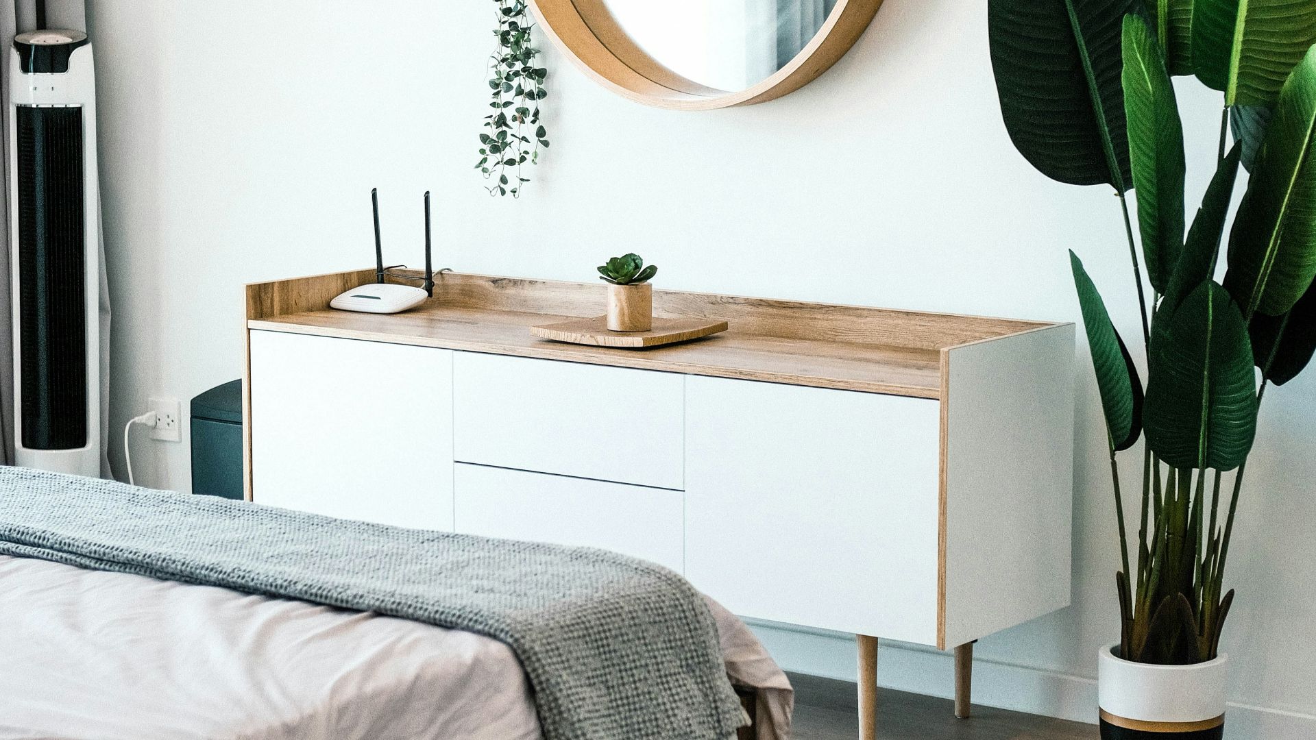 white wooden dresser with mirror