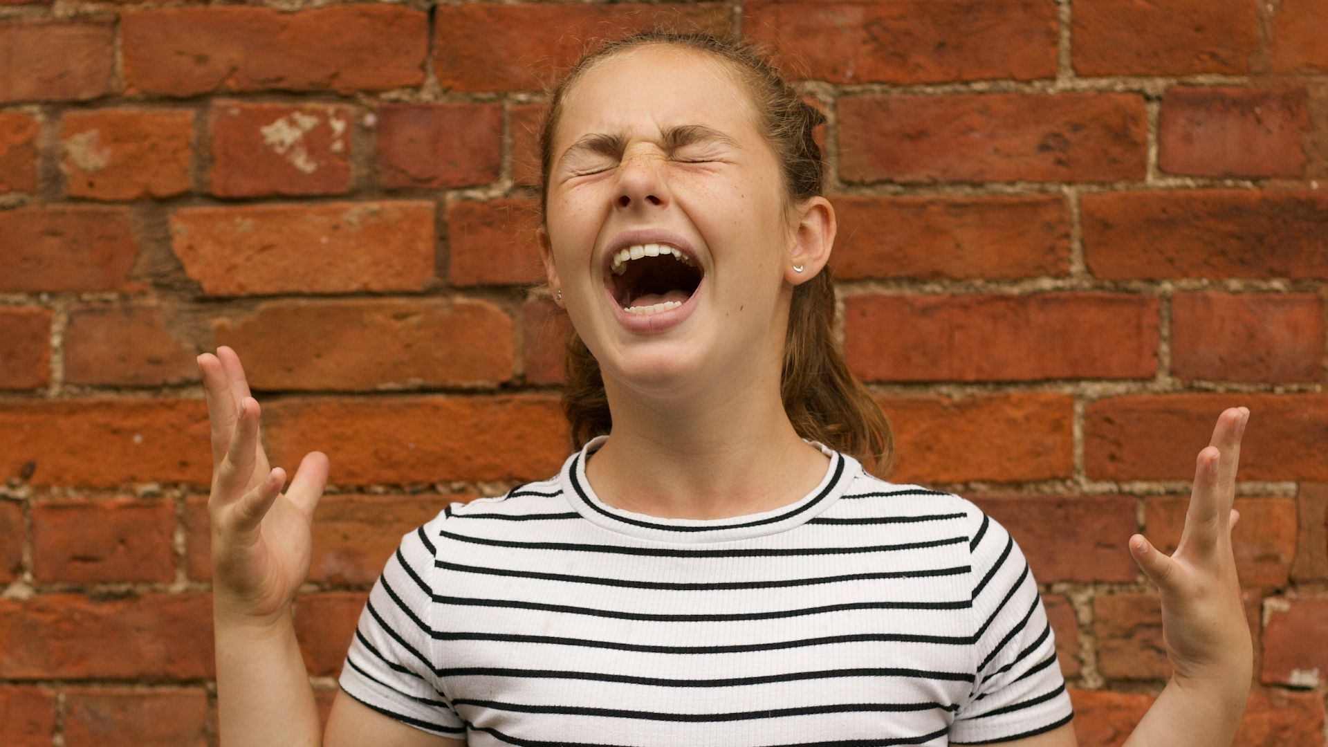 woman wearing black and white striped shirt