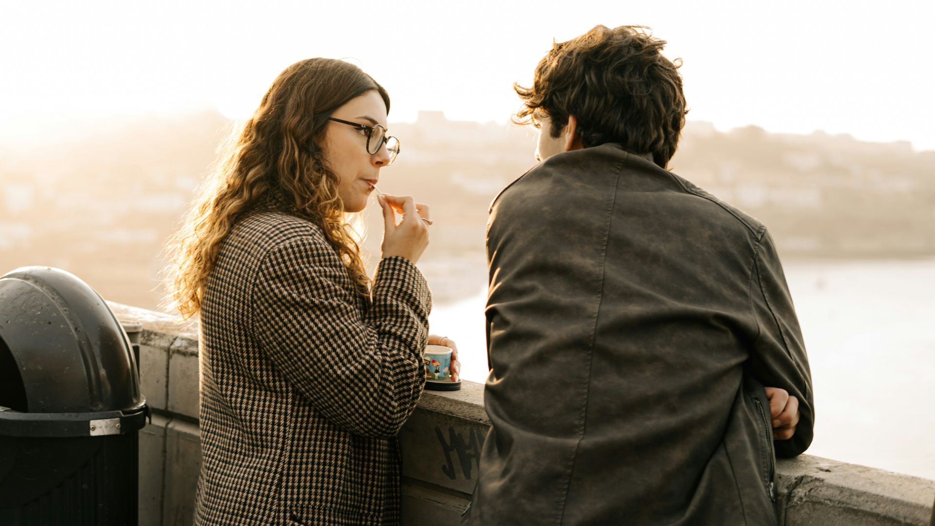 A man and a woman standing next to each other