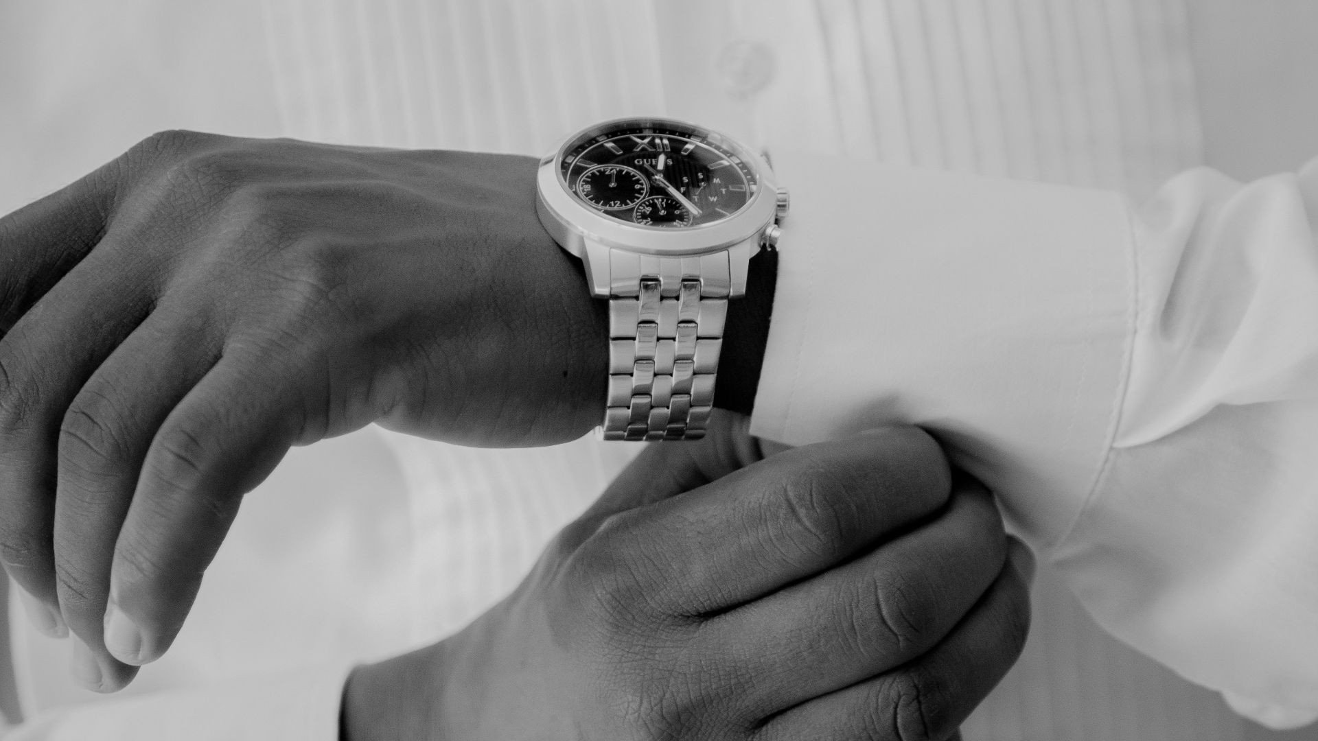 a close up of a person wearing a watch