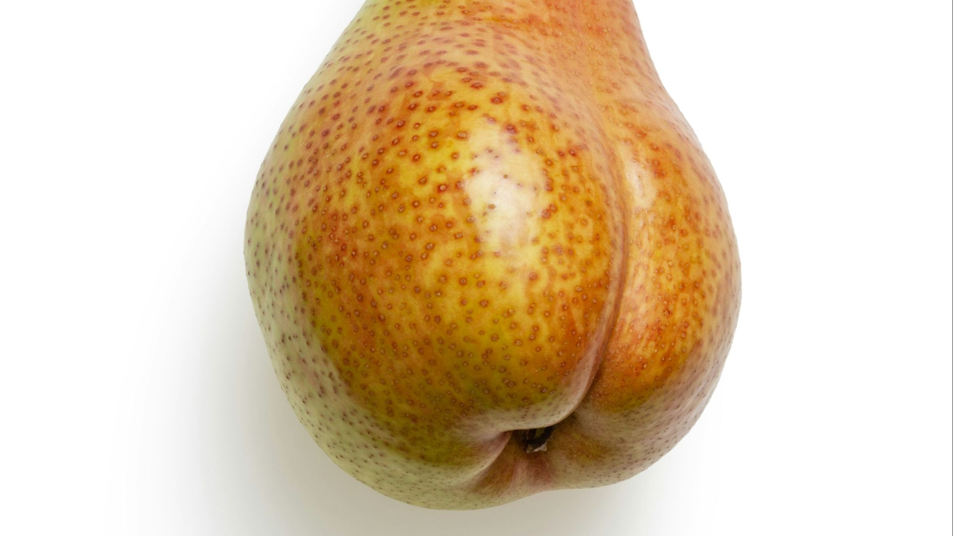 brown and yellow fruit on white surface