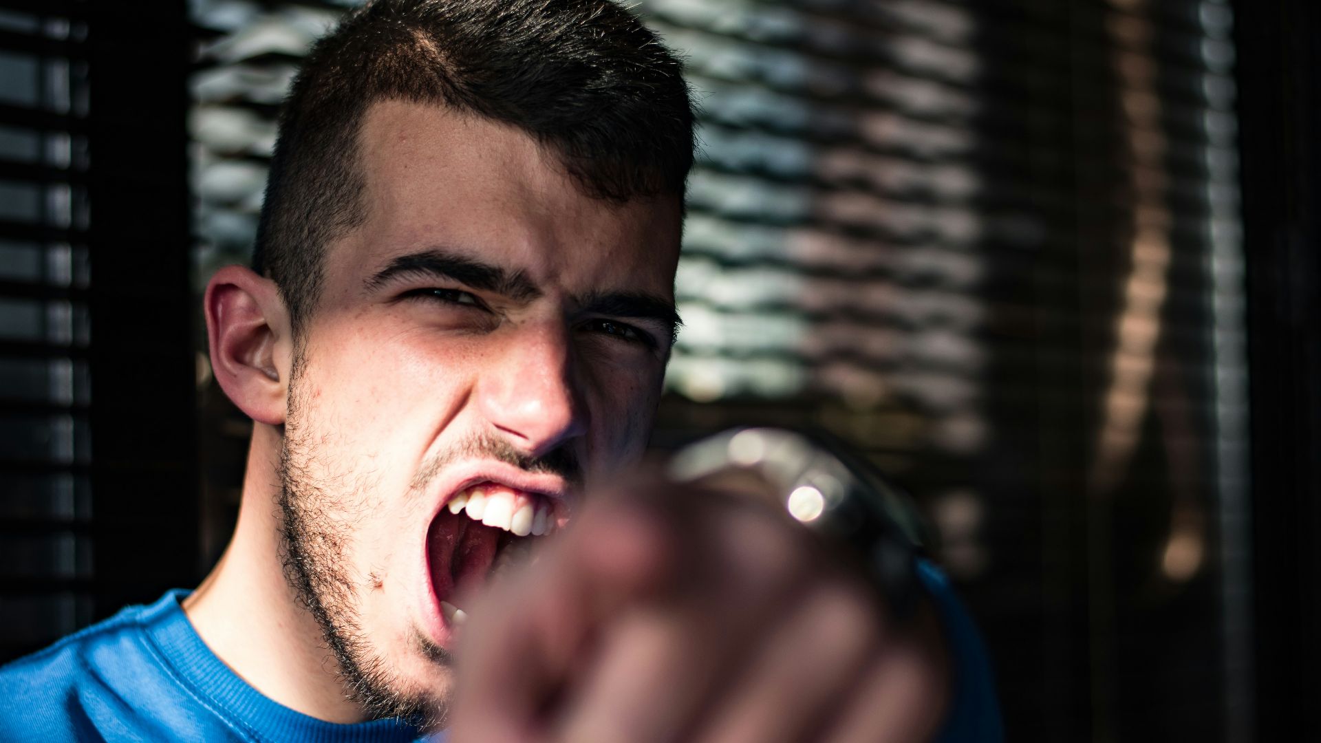 man in blue crew neck shirt