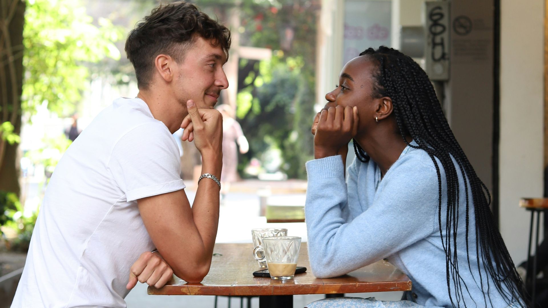 a man and a woman sitting at a table