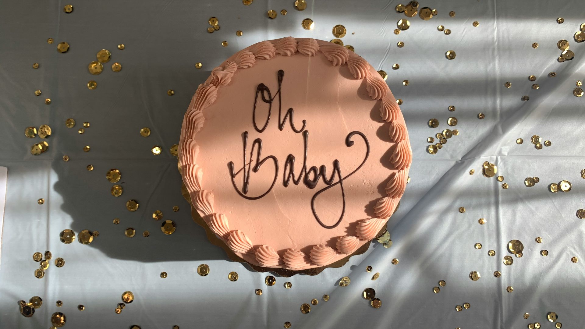 happy new year printed pink and white floral textile