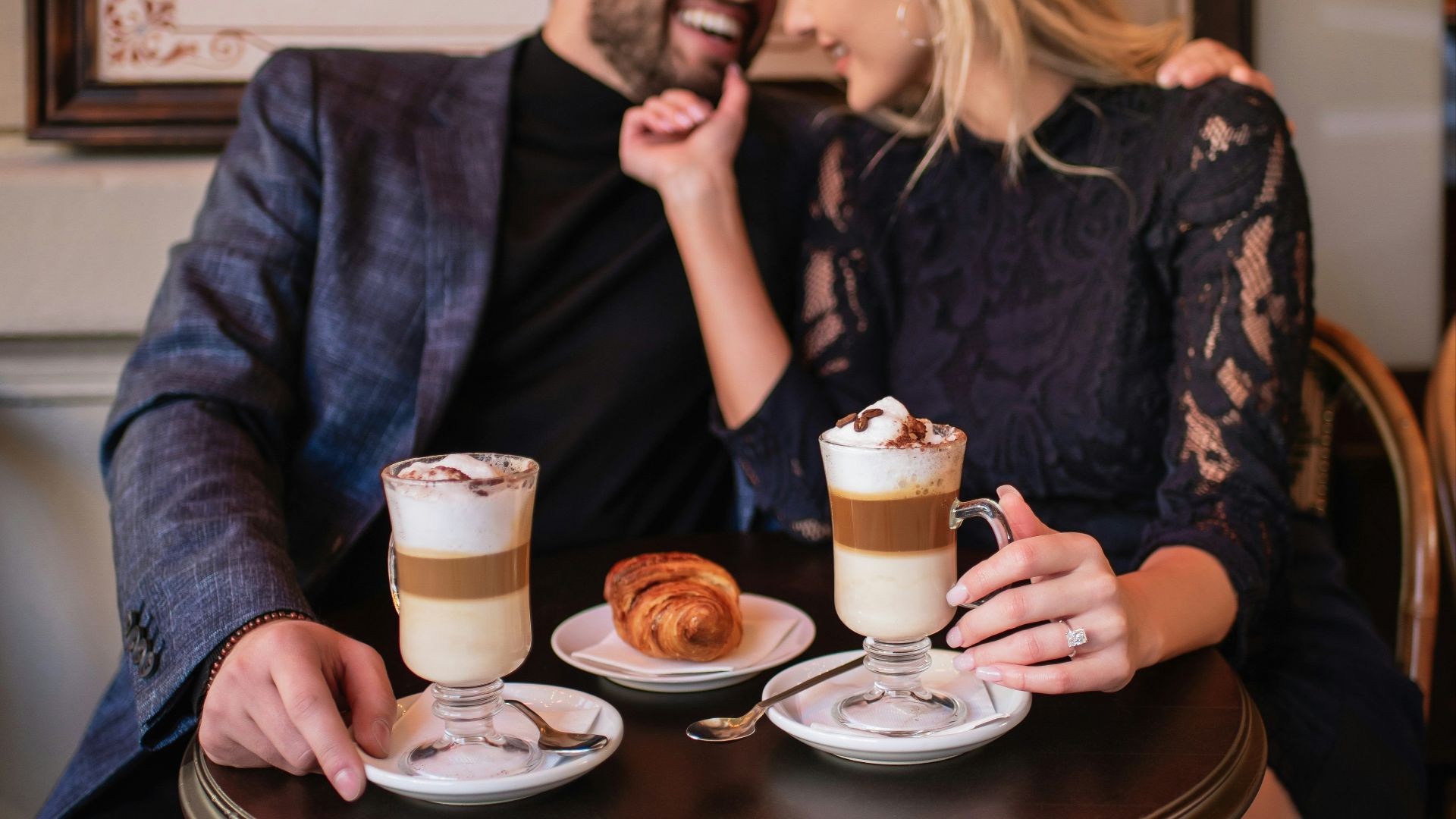 woman in black shirt sitting beside woman in black shirt