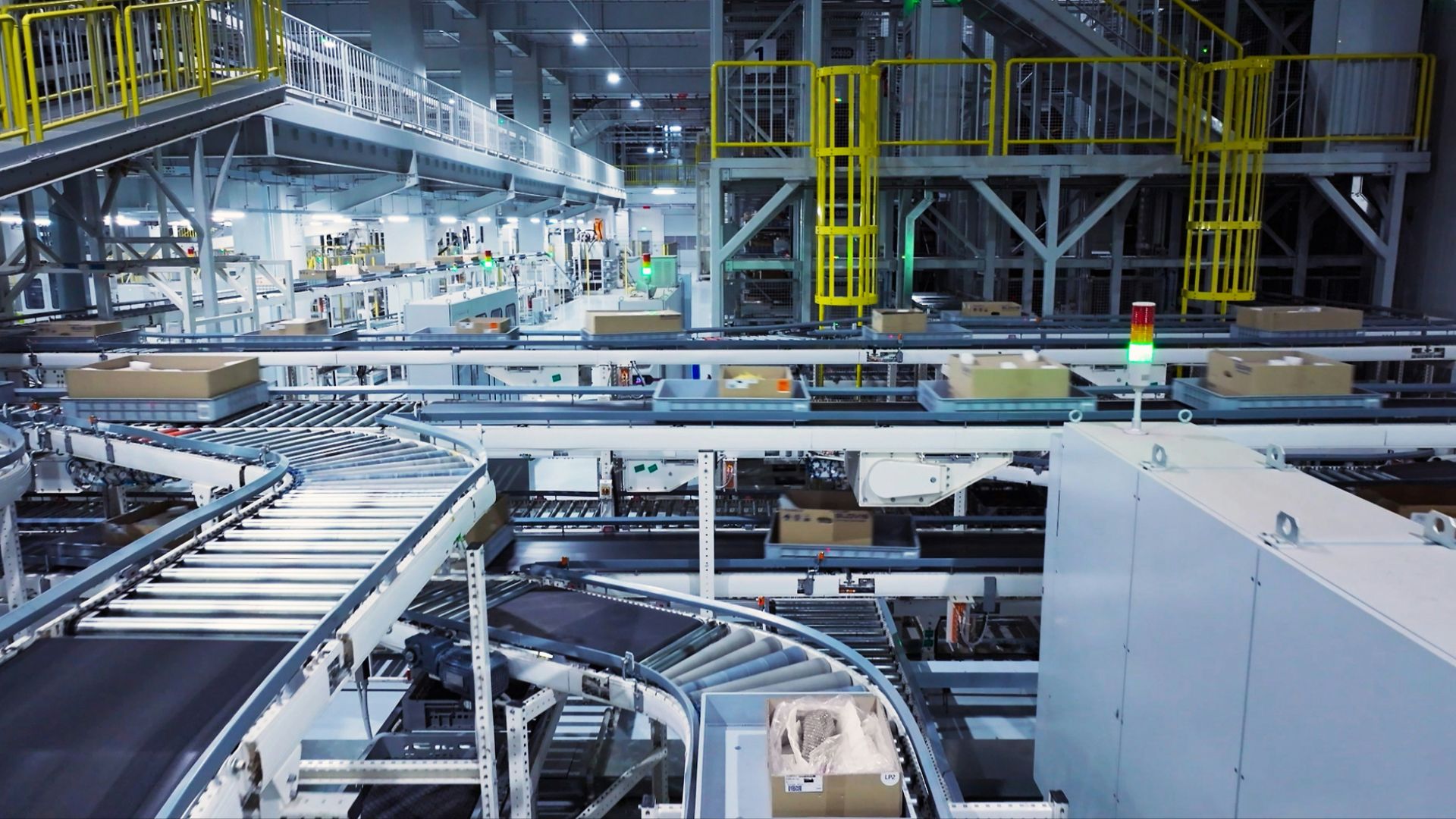 a factory filled with lots of machines and boxes