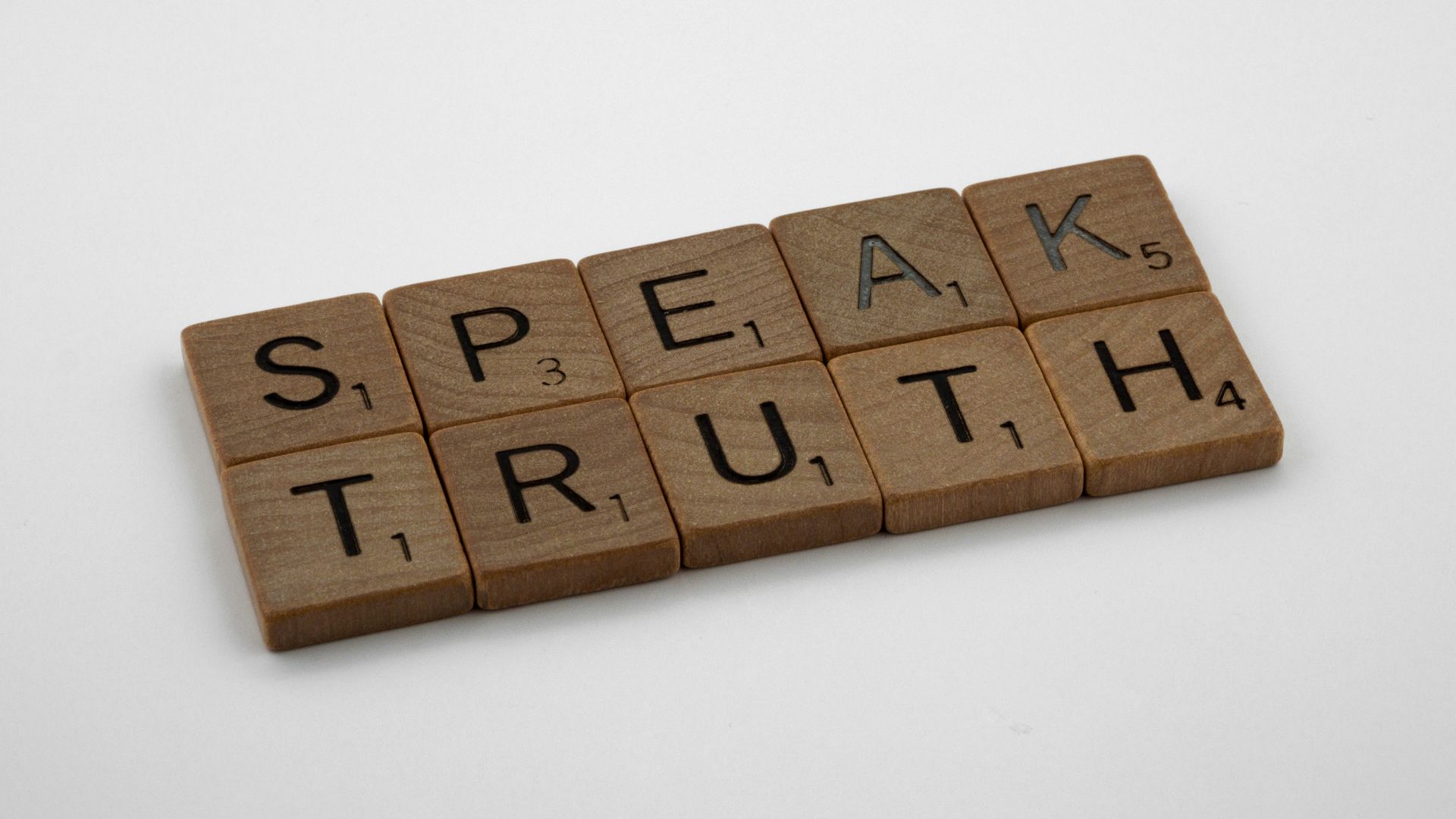 brown wooden blocks on white table